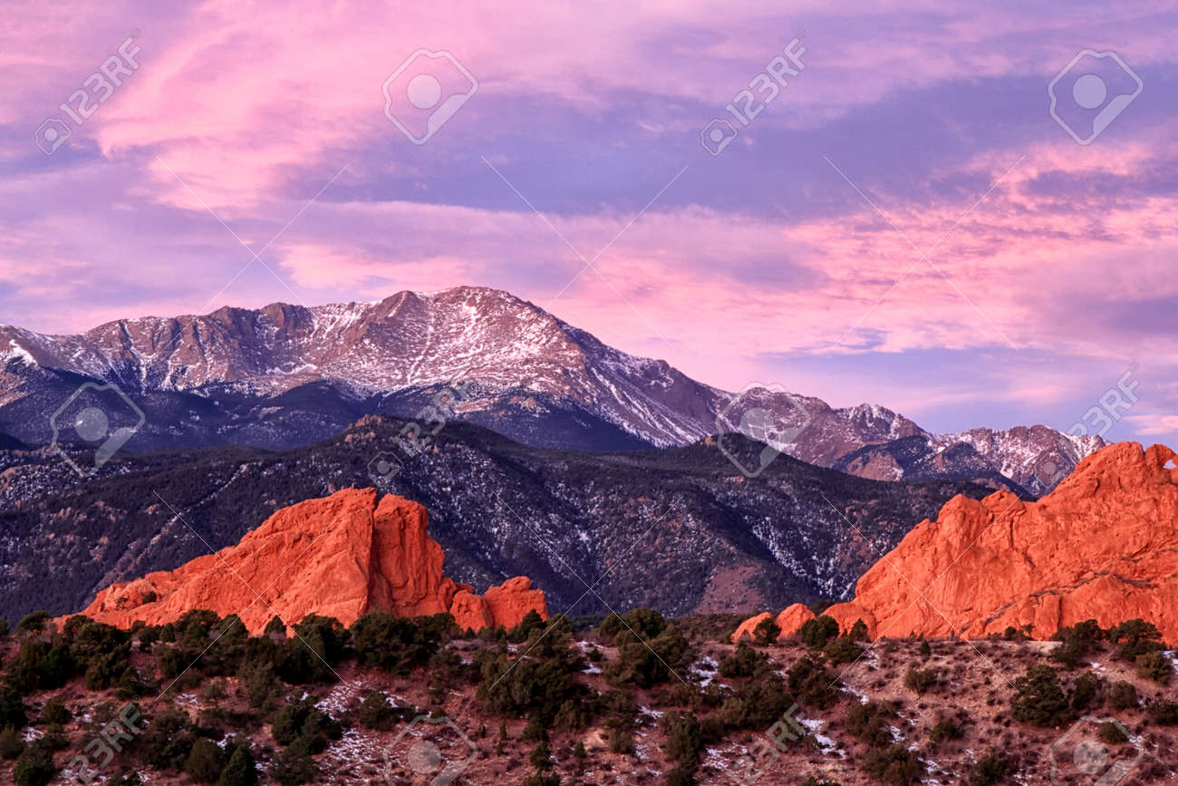 A Purple Pikes peak Mountain overlooking Garden of the Gods in..
