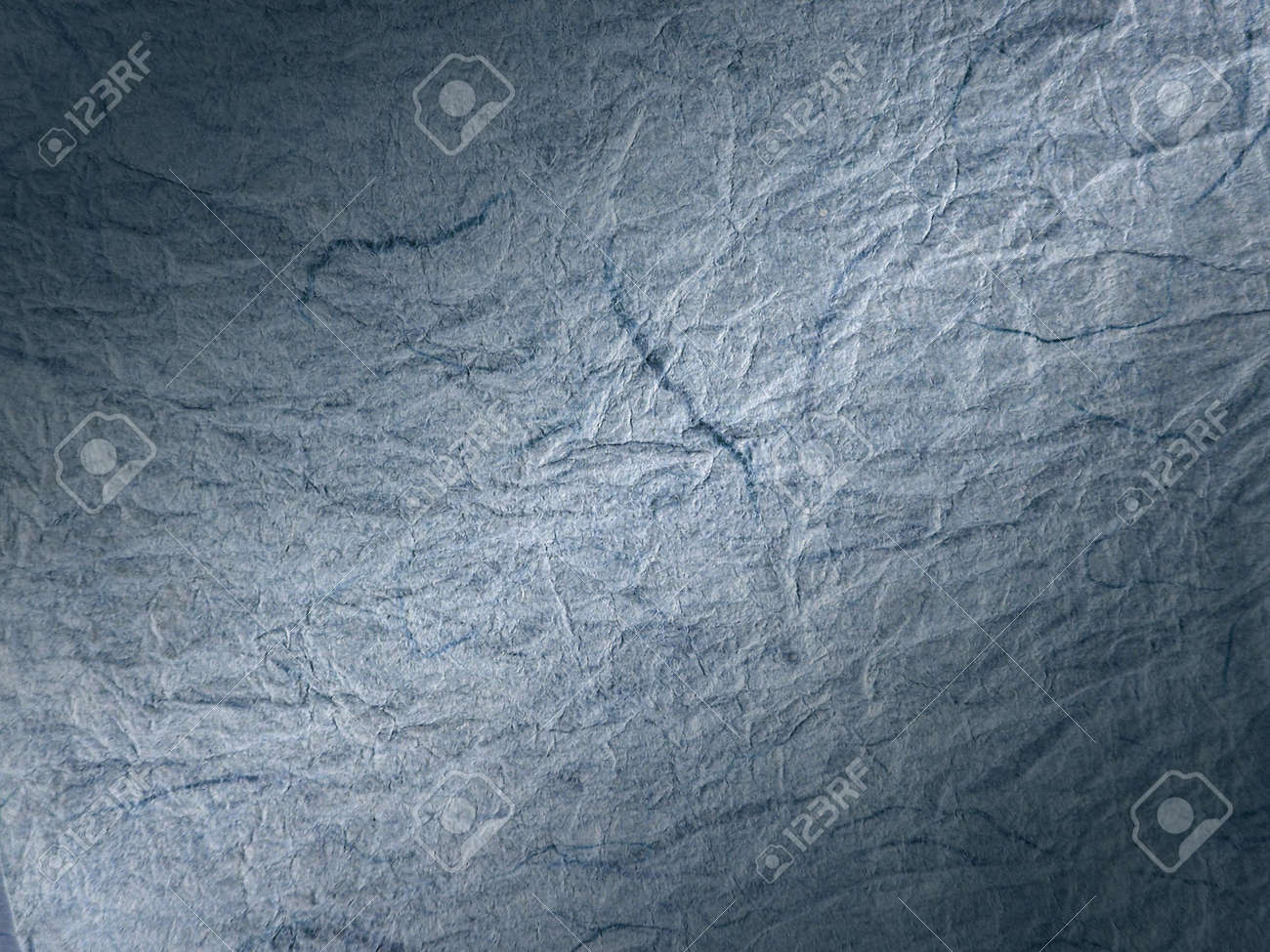 Crumpled textured paper with blue lighting effect - 635890 Crumpled textured paper with blue lighting effect - 635890
