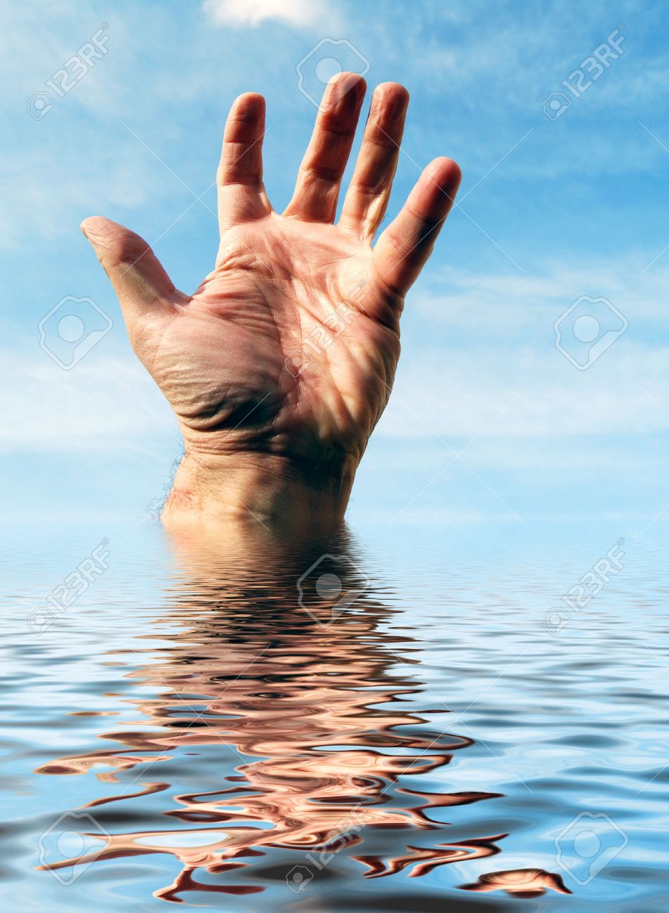 mans hand reaches out of simulated water stock photo picture and reaches