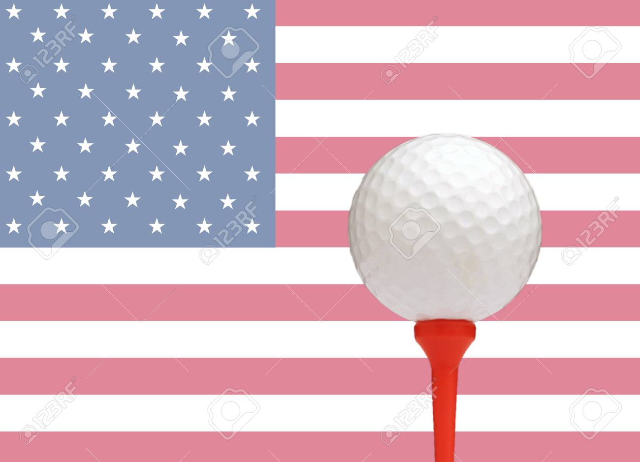 golf ball on tee in front of the flag of the united states of