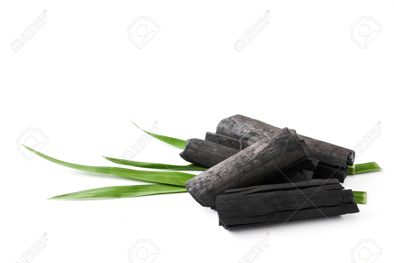 Natural wood charcoal on white background - 105102524 Natural wood charcoal on white background - 105102524