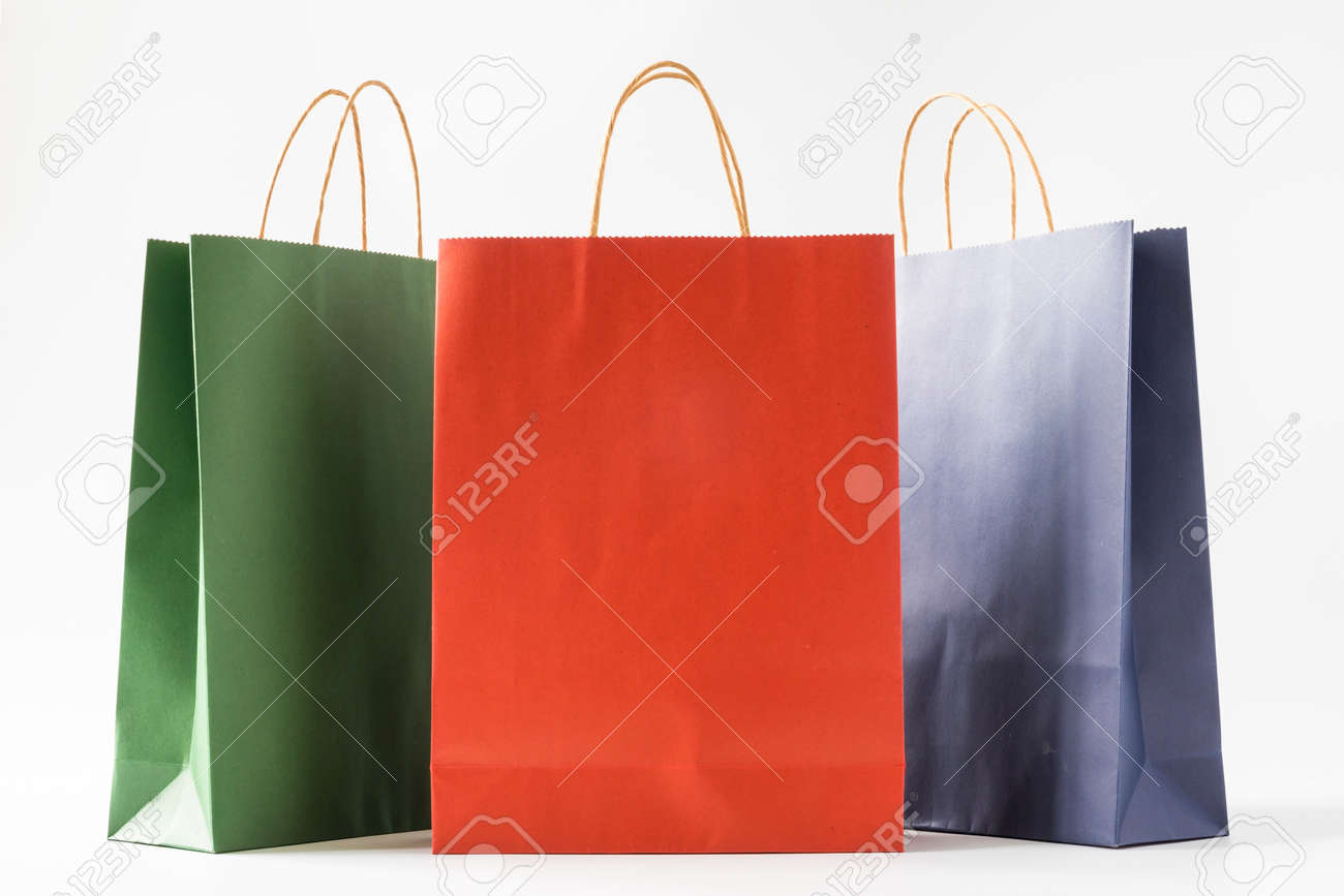 Colourful paper shopping bags on white background - 109206592 Colourful paper shopping bags on white background - 109206592