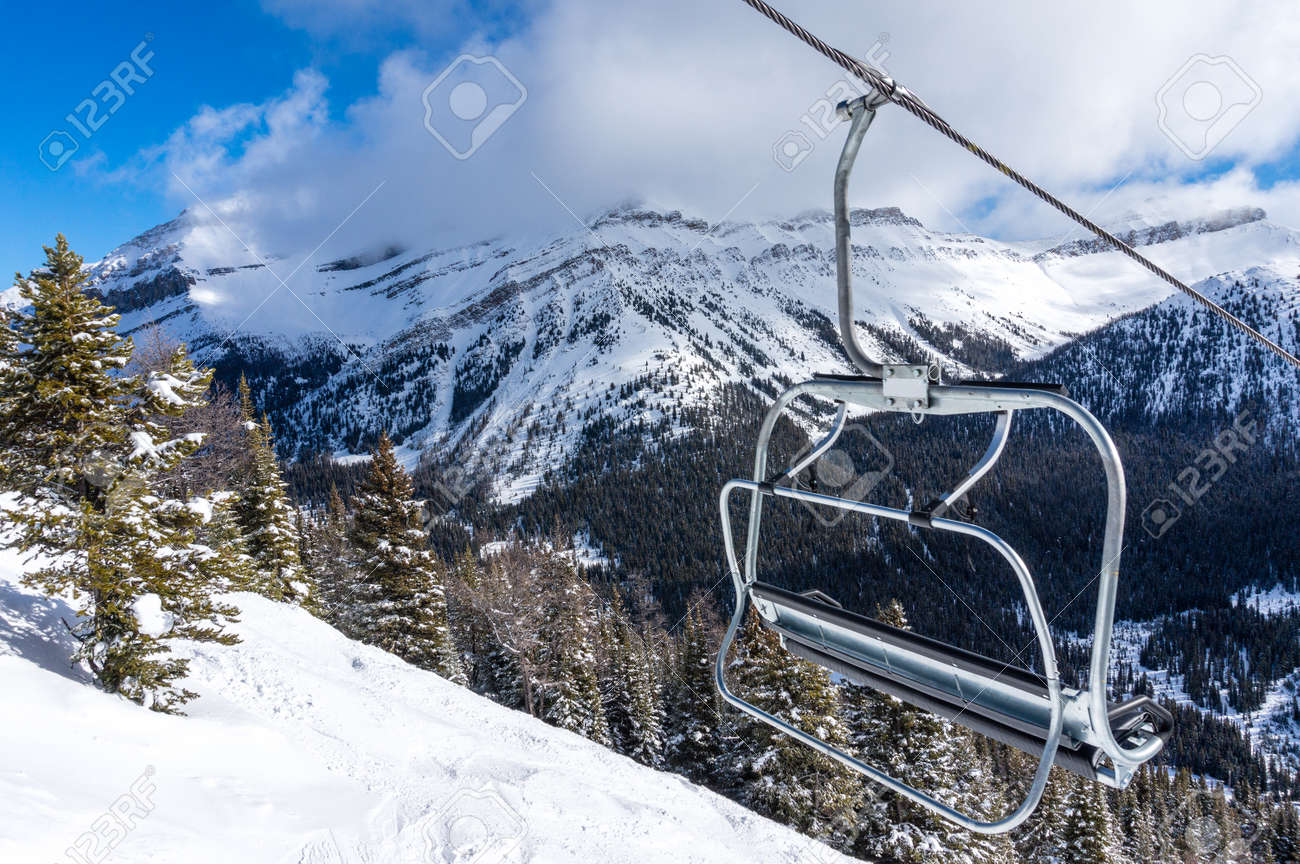 empty chair lift empty ski lift chair with rocky mountains in the background stock photo 36979540 ski lift chair with in the background empty chair lift empty ski lift chair with rocky mountains in the background stock photo 36979540 ski lift chair with in the background