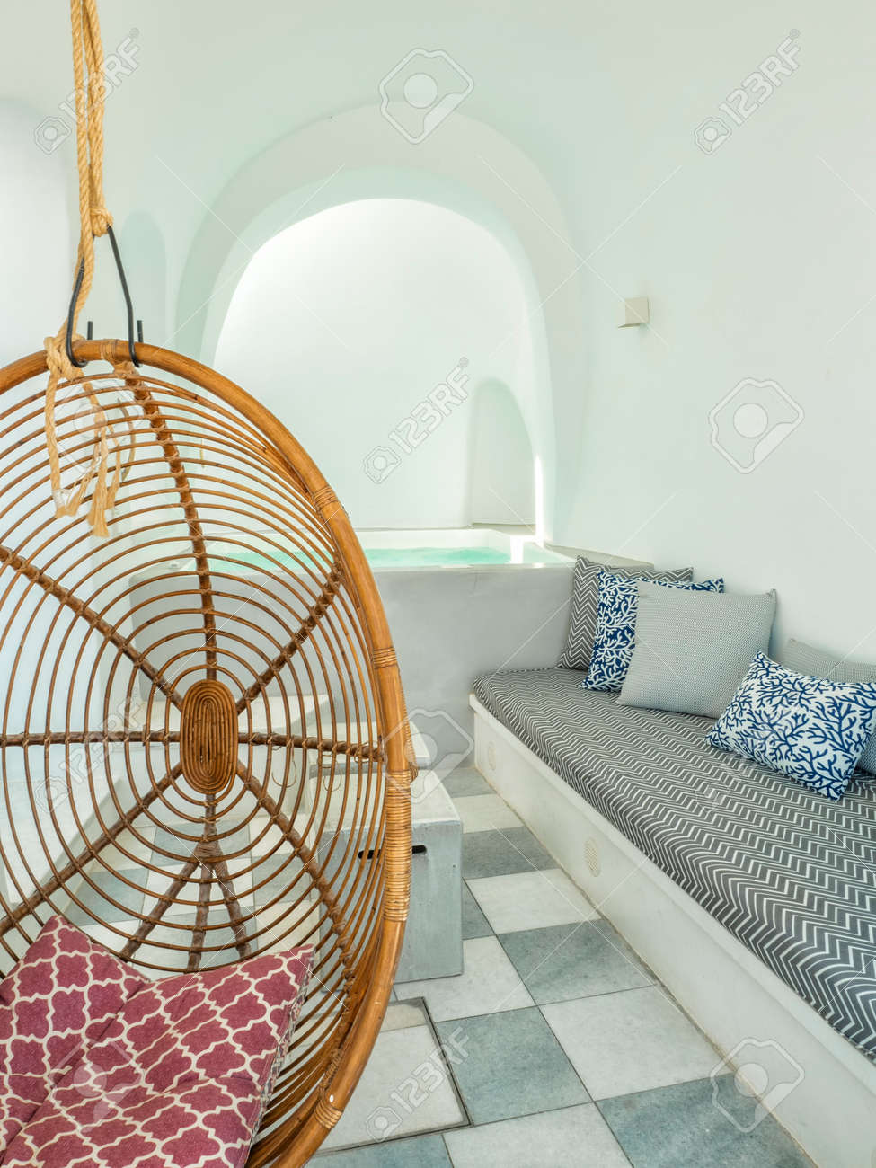 A Relaxing Room With An Oval Swing Hanging Chair A Sofa And Stock Photo Picture And Royalty Free Image Image 146476574