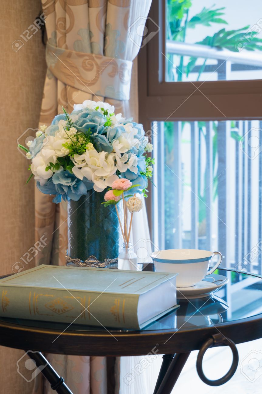 Book Teacup And Flower Vase On Side Table Beside The Window Stock Photo Picture And Royalty Free Image Image 30842687