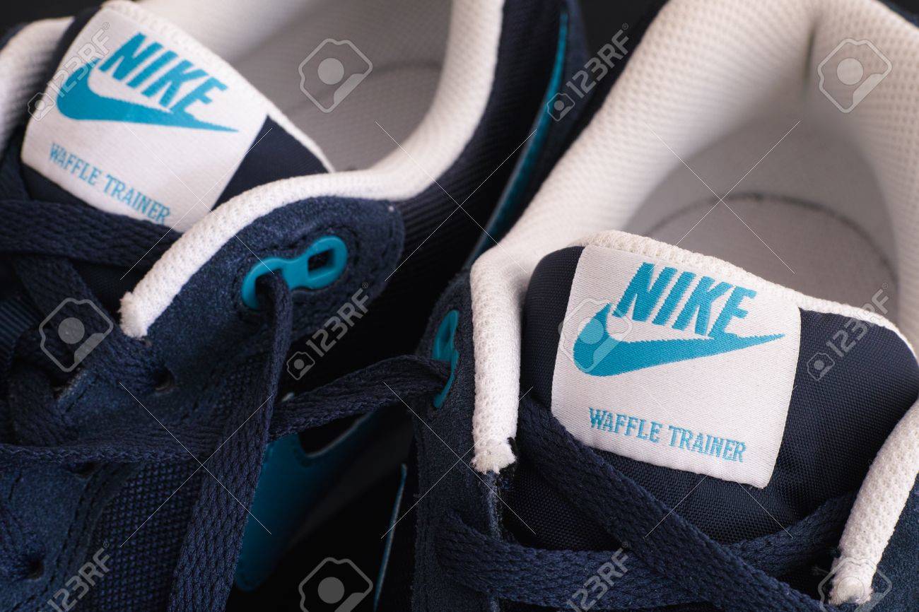 Tambov, Russian Federation - May 10, 2015 New blue Nike waffle trainer shoes. Close-up. Studio shot. - 40051636