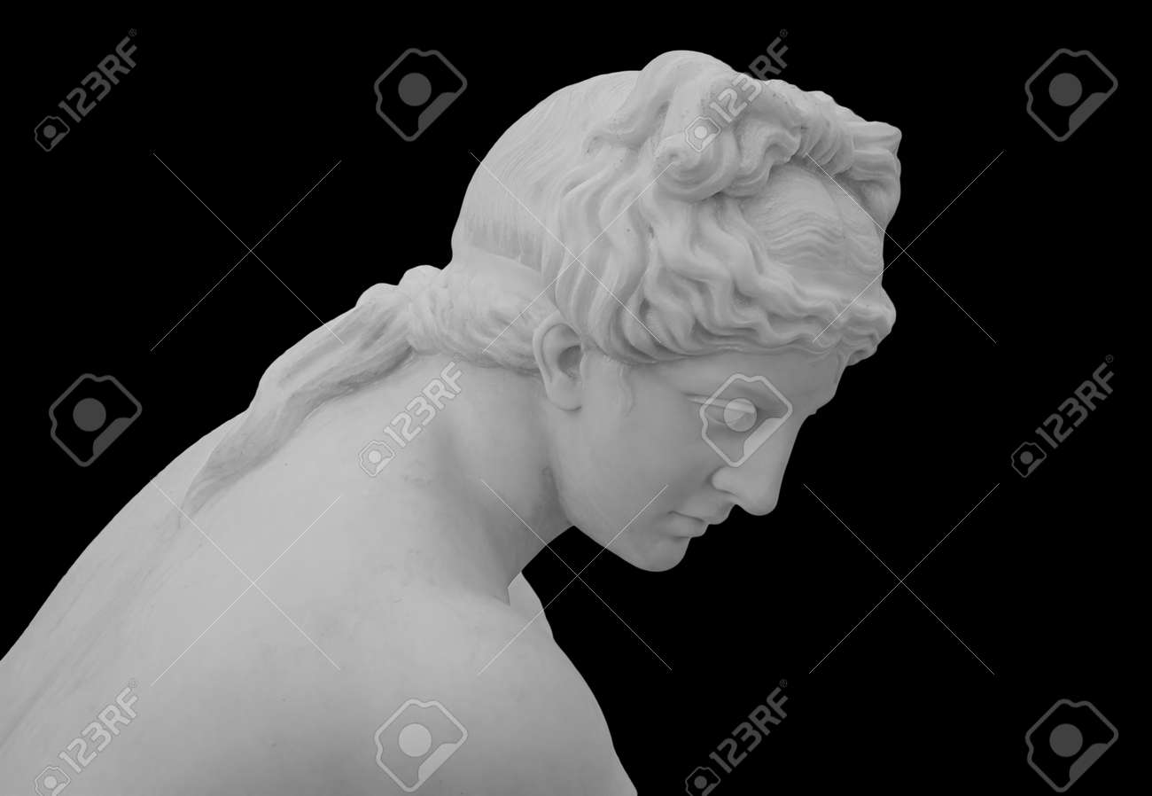 Ancient white marble sculpture head of young woman. Statue of sensual renaissance art era woman antique style. Face isolated on black background - 169669054 Ancient white marble sculpture head of young woman. Statue of sensual renaissance art era woman antique style. Face isolated on black background - 169669054