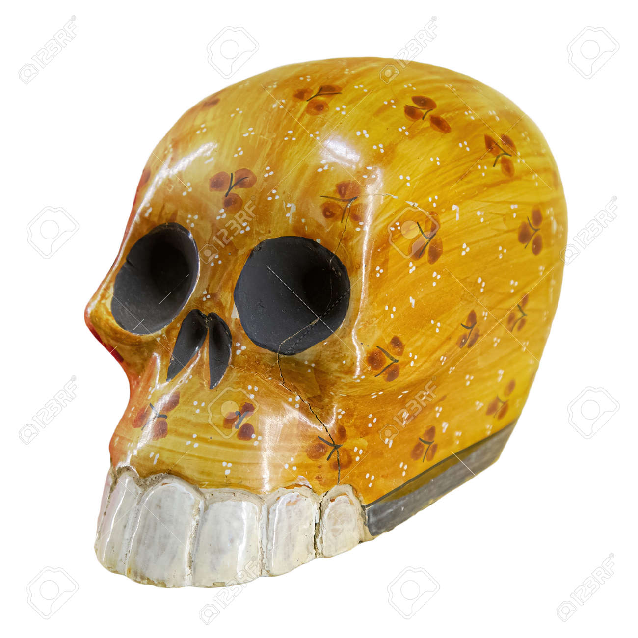 Typical Mexican skull painted isolated on white background. Dia de los muertos. Creative and minimal Day of the Dead or Halloween layout. Skull yellow - 169669219 Typical Mexican skull painted isolated on white background. Dia de los muertos. Creative and minimal Day of the Dead or Halloween layout. Skull yellow - 169669219