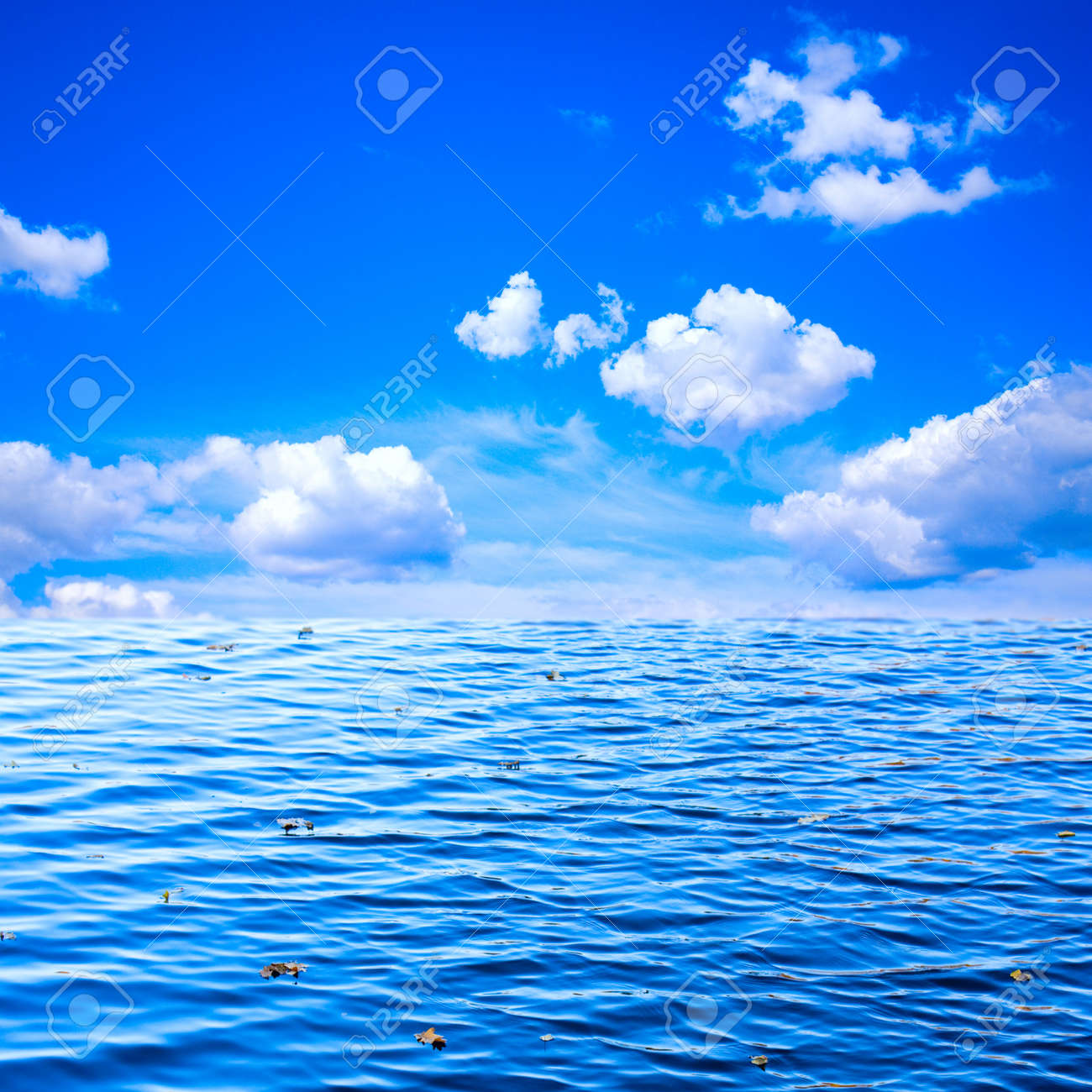 Beautiful View Of Blue Sky With White Clouds And Ocean As