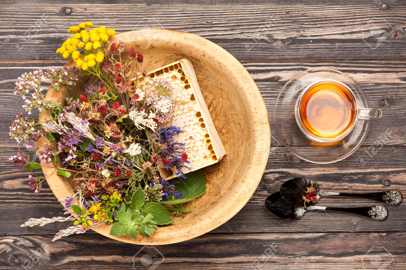 Medical herbs and flowers and herbal tea. top view, horizontal - 44189926 Medical herbs and flowers and herbal tea. top view, horizontal - 44189926
