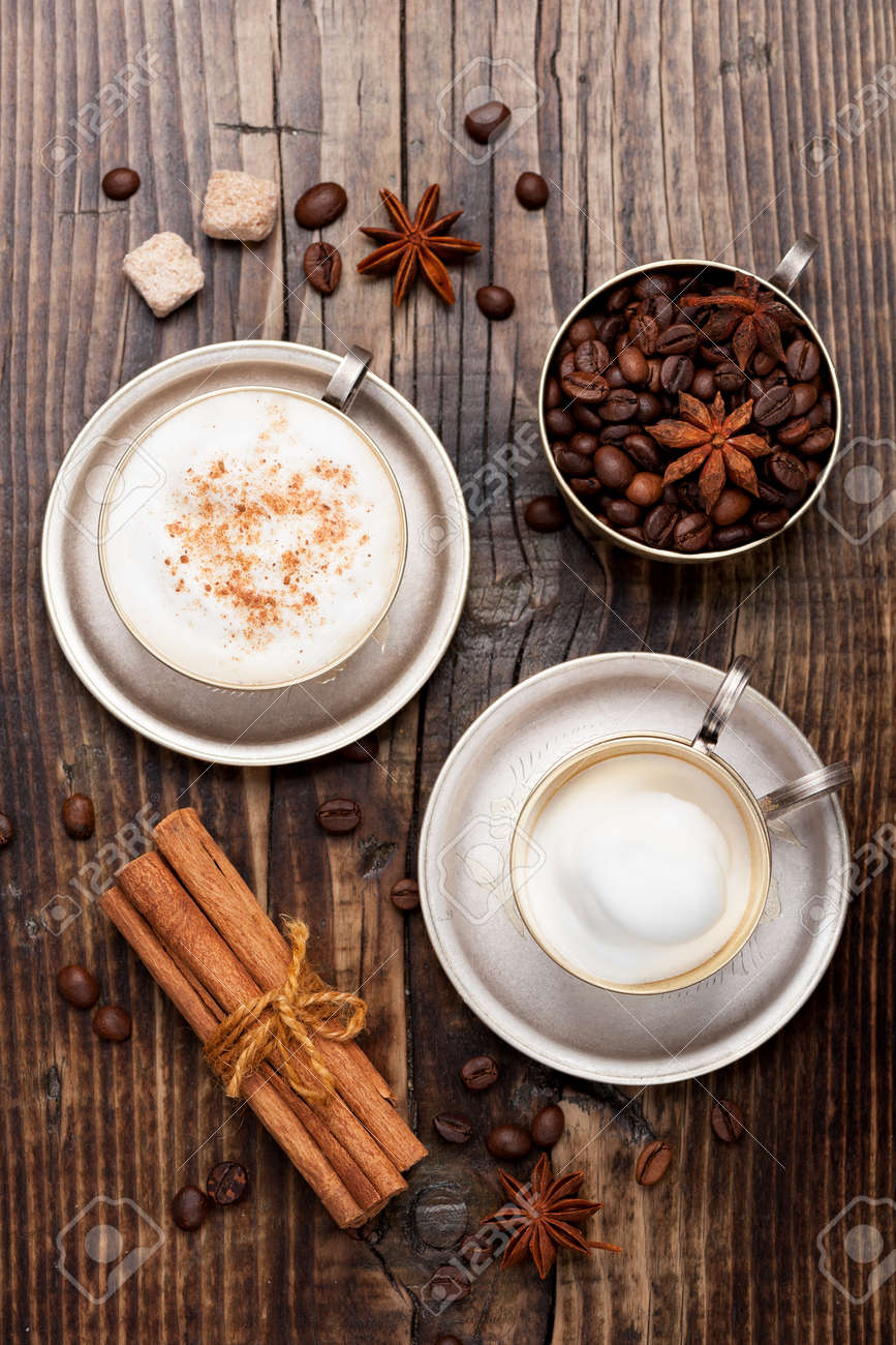 Coffee cappuccino cup on wooden table. Top view - 51355824 Coffee cappuccino cup on wooden table. Top view - 51355824