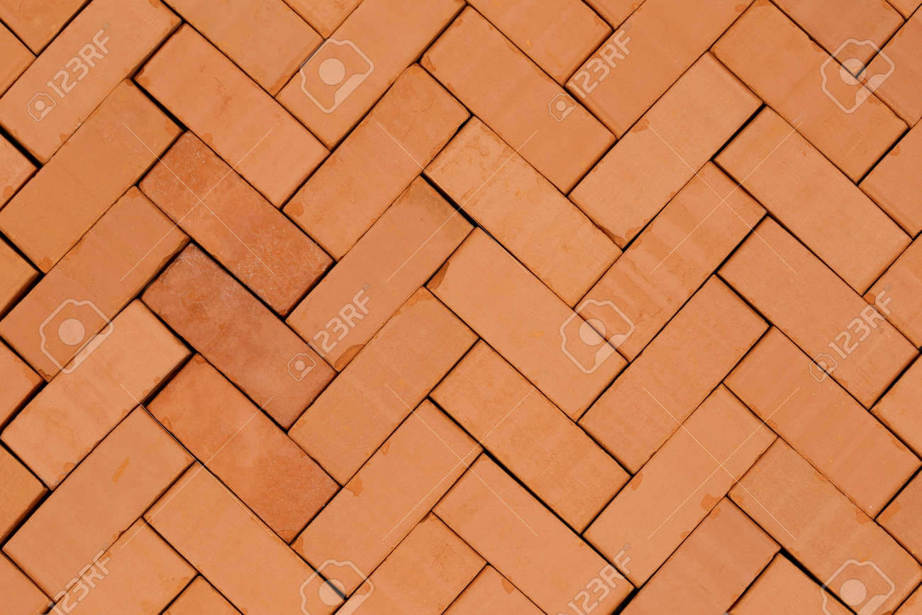 fish bone pattern with red bricks on ground stock photo picture