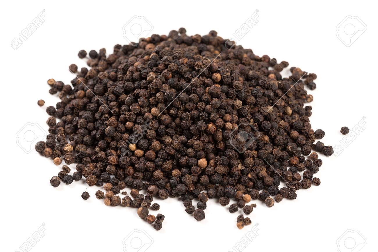 Black pepper was placed on a white background and isolated - 32495443 Black pepper was placed on a white background and isolated - 32495443