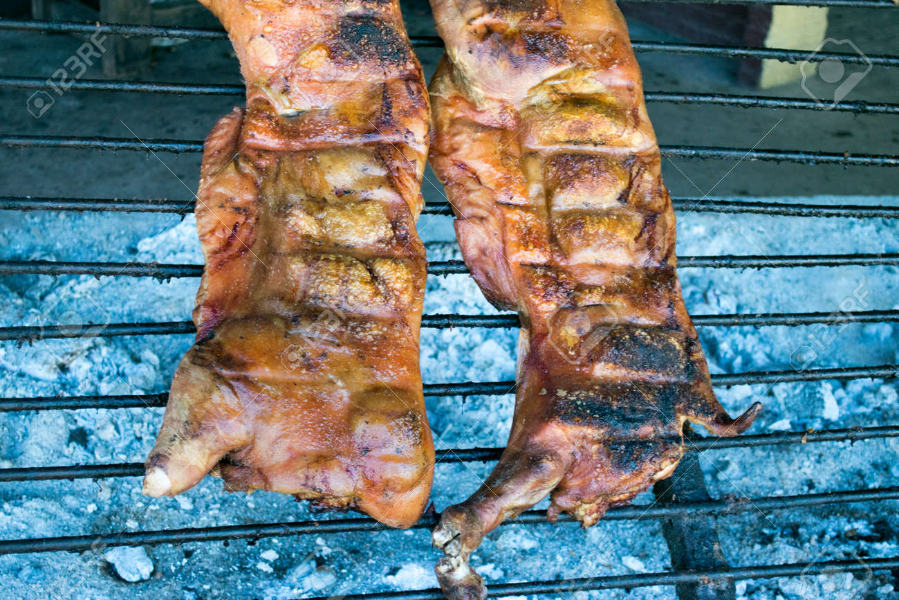 Traditional Roasted Asado Of Beef And Pork Meat. It Is A Traditional Dish  In Argentina, Uruguay, Paraguay, Chile, And Brazil Stock Photo, Picture and  Royalty Free Image. Image 91241819., image size:1300x867