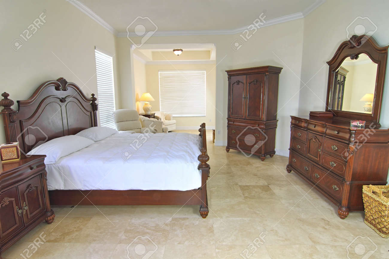 overview of a beautiful classic bedroom suite in a private overview of a beautiful classic bedroom suite in a private
