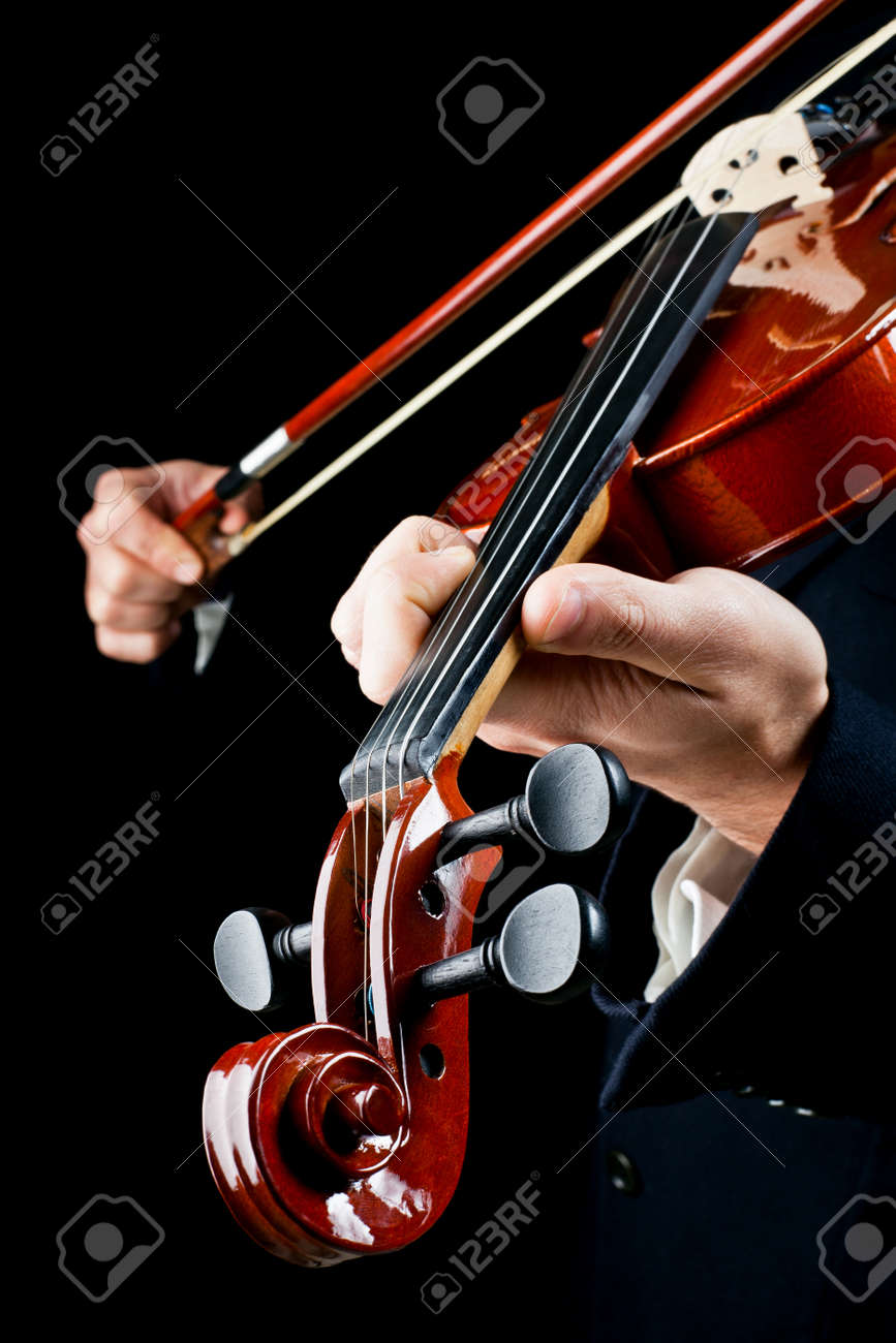 particularly of the hands of the violinist, playing the notes - 12962803 particularly of the hands of the violinist, playing the notes - 12962803