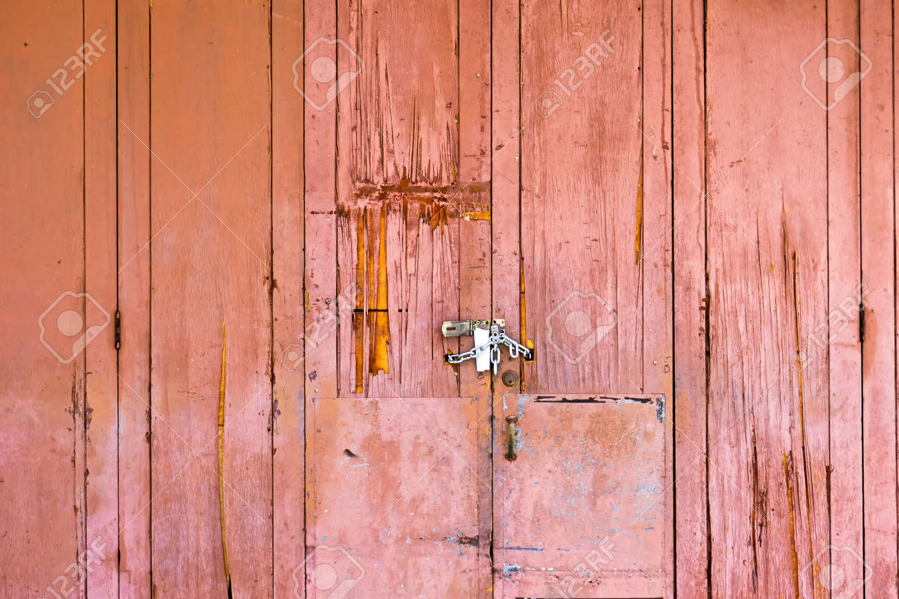 Aged And Grunge Rustic Wood Door Background With Textures Stock