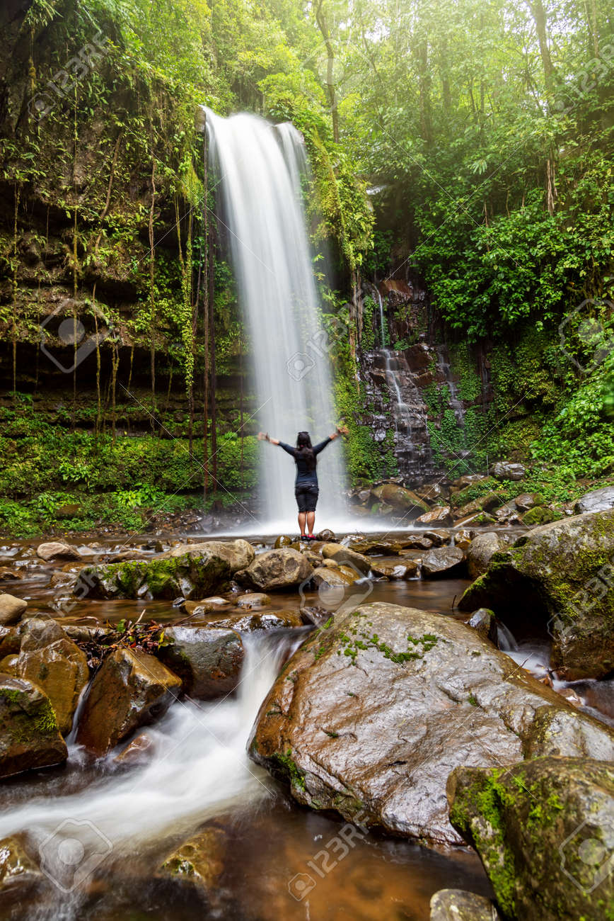 Unidentified Woman Standing At Mahua Waterfall In Crocker Range National Park Tambunan Sabah Borneo Malaysia Stock Photo Picture And Royalty Free Image Image 129754785