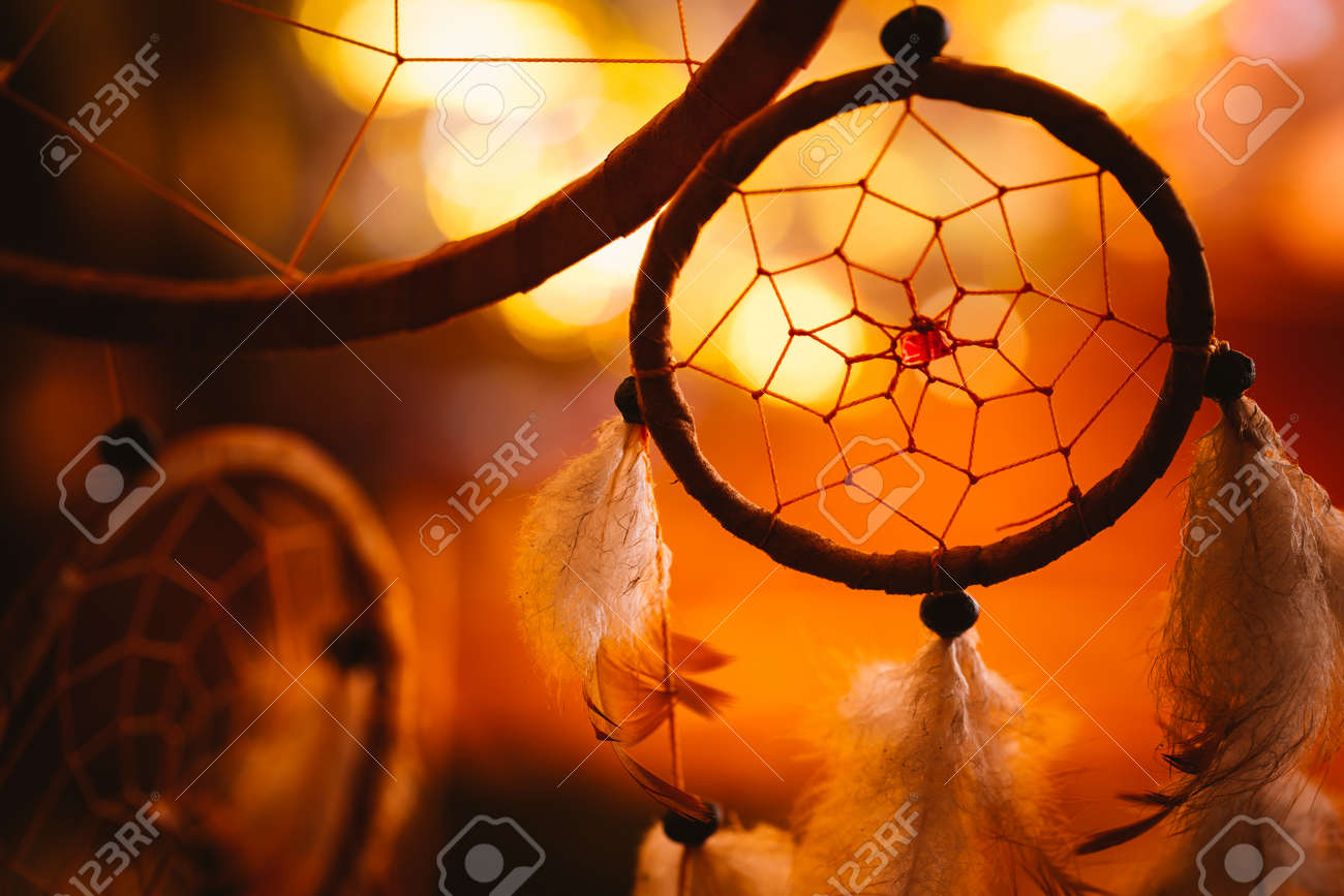 black and white photo of a dream catcher at sunset purple dark background. - 61656557 black and white photo of a dream catcher at sunset purple dark background. - 61656557