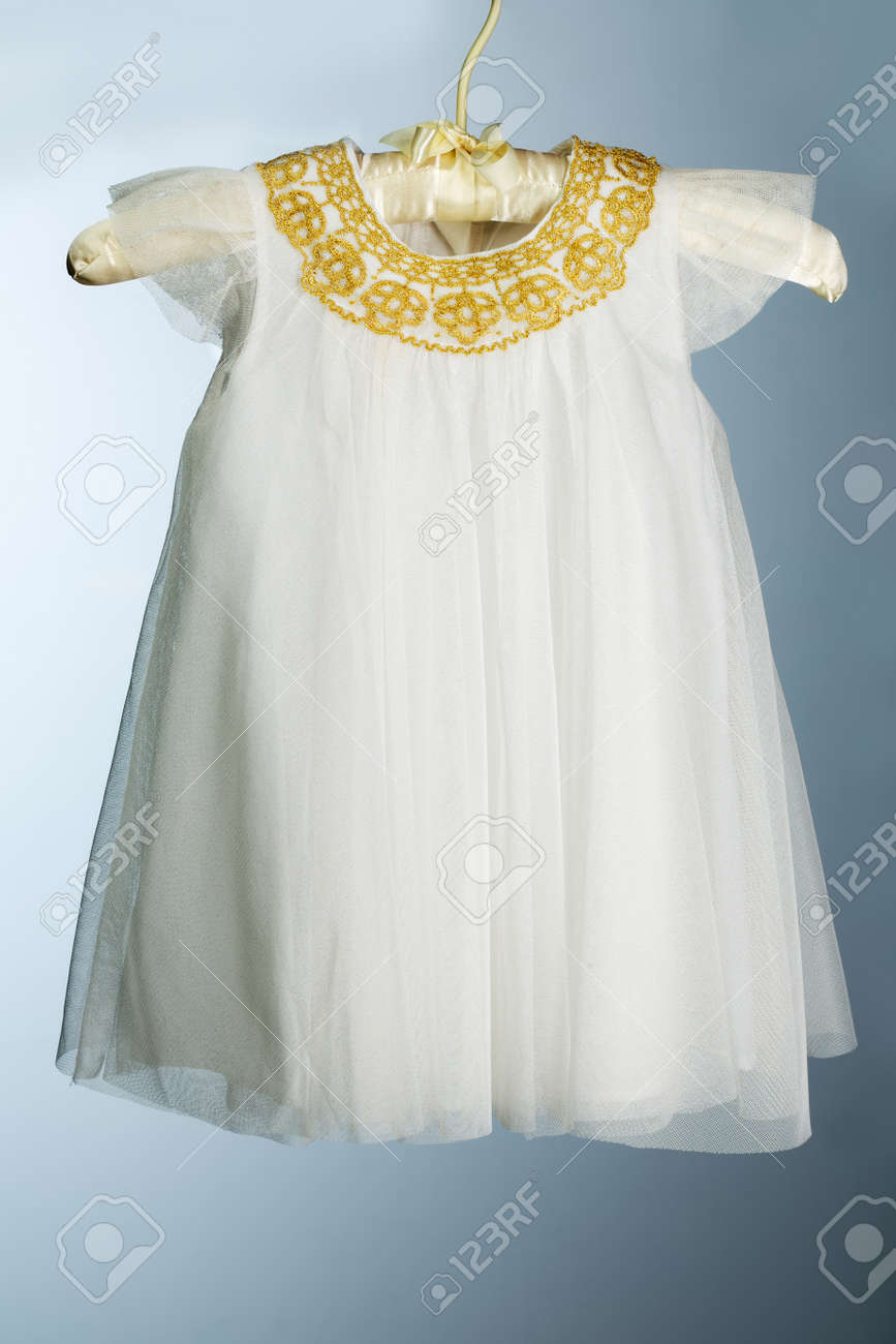 white and gold baby dress