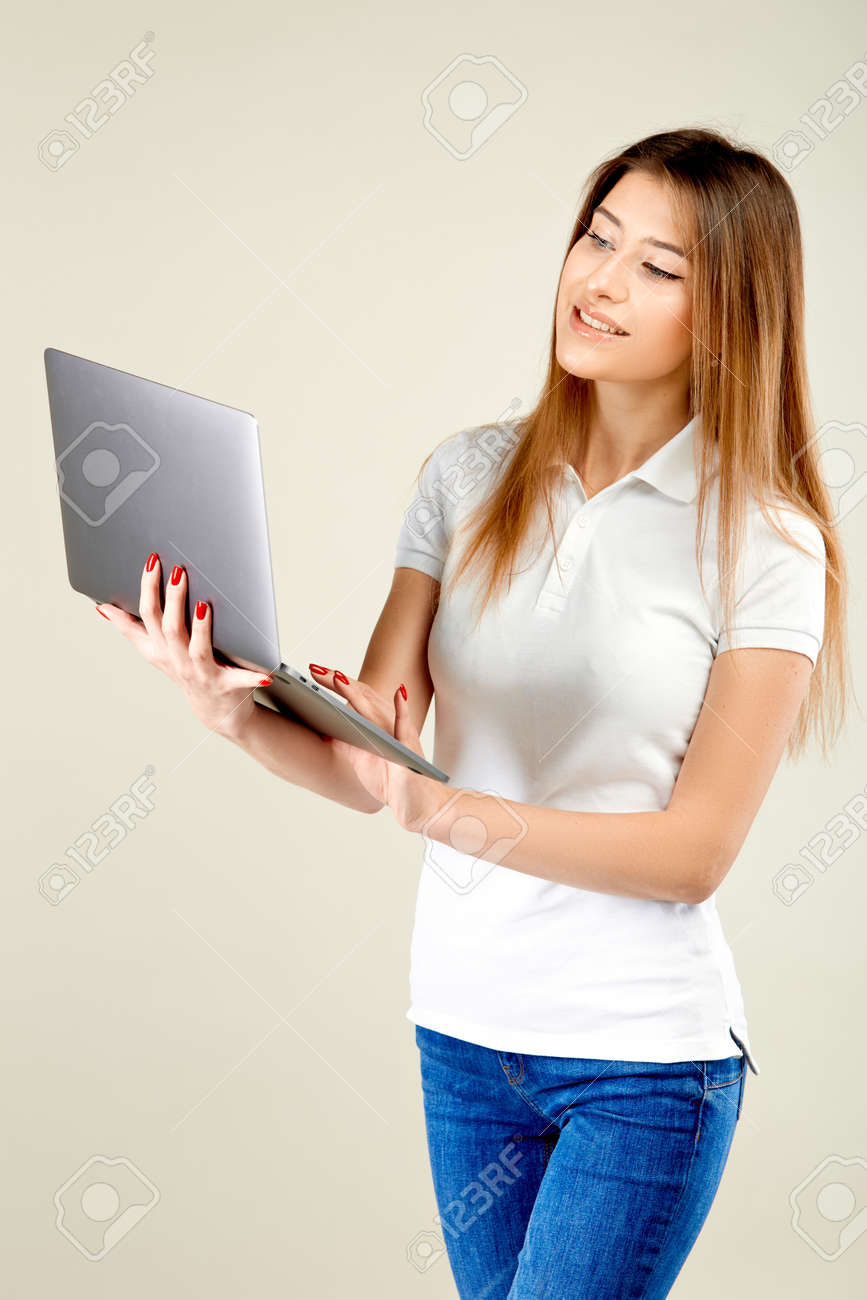 white polo shirt and blue jeans