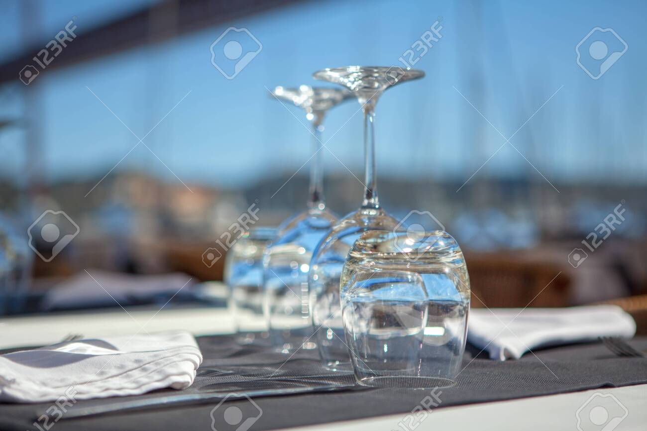 empty glasses on the table in restaurant - 127515472 empty glasses on the table in restaurant - 127515472