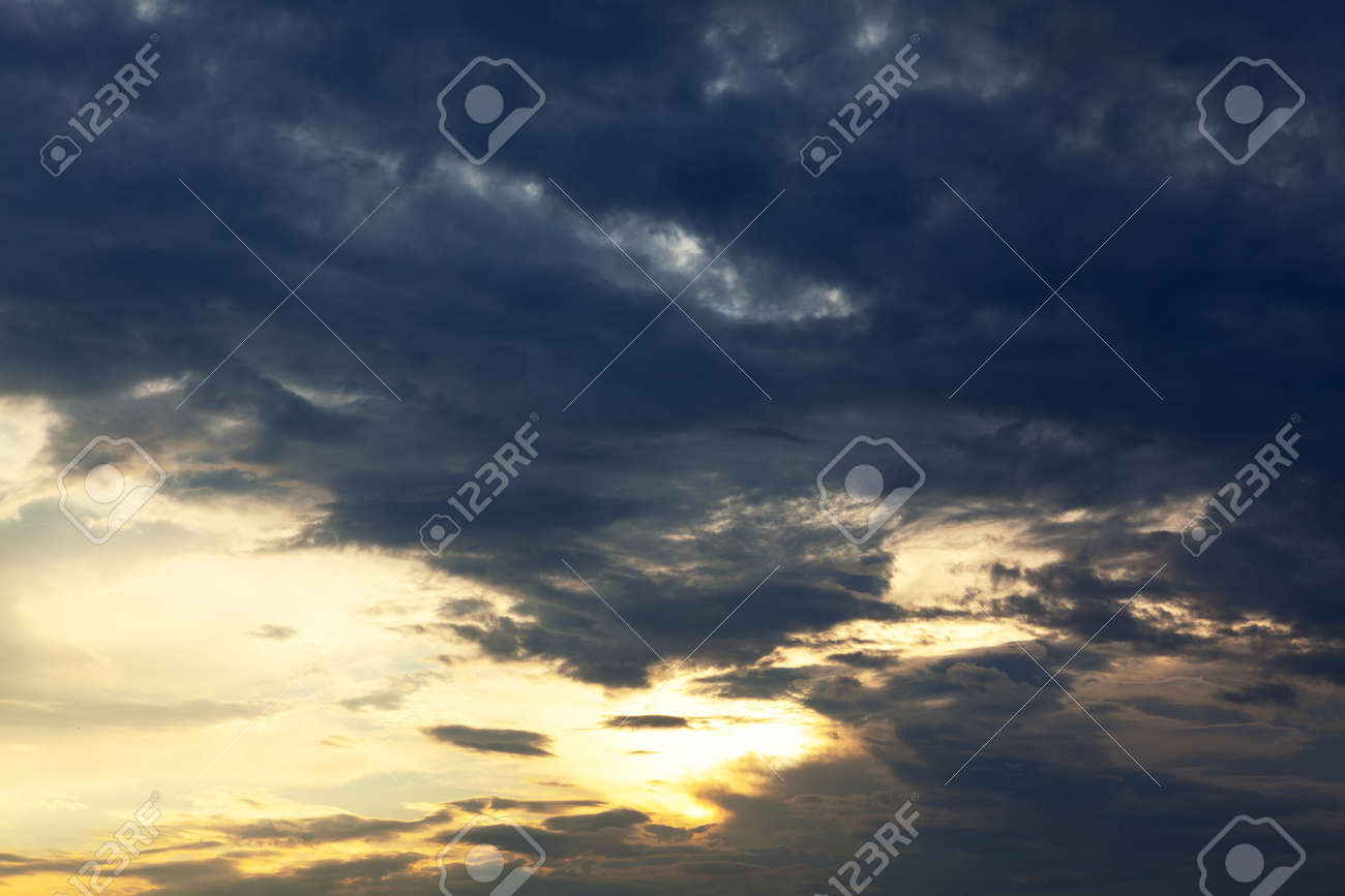 Clouds in contrast . Darkness and brightness on the sky - 167986828 Clouds in contrast . Darkness and brightness on the sky - 167986828