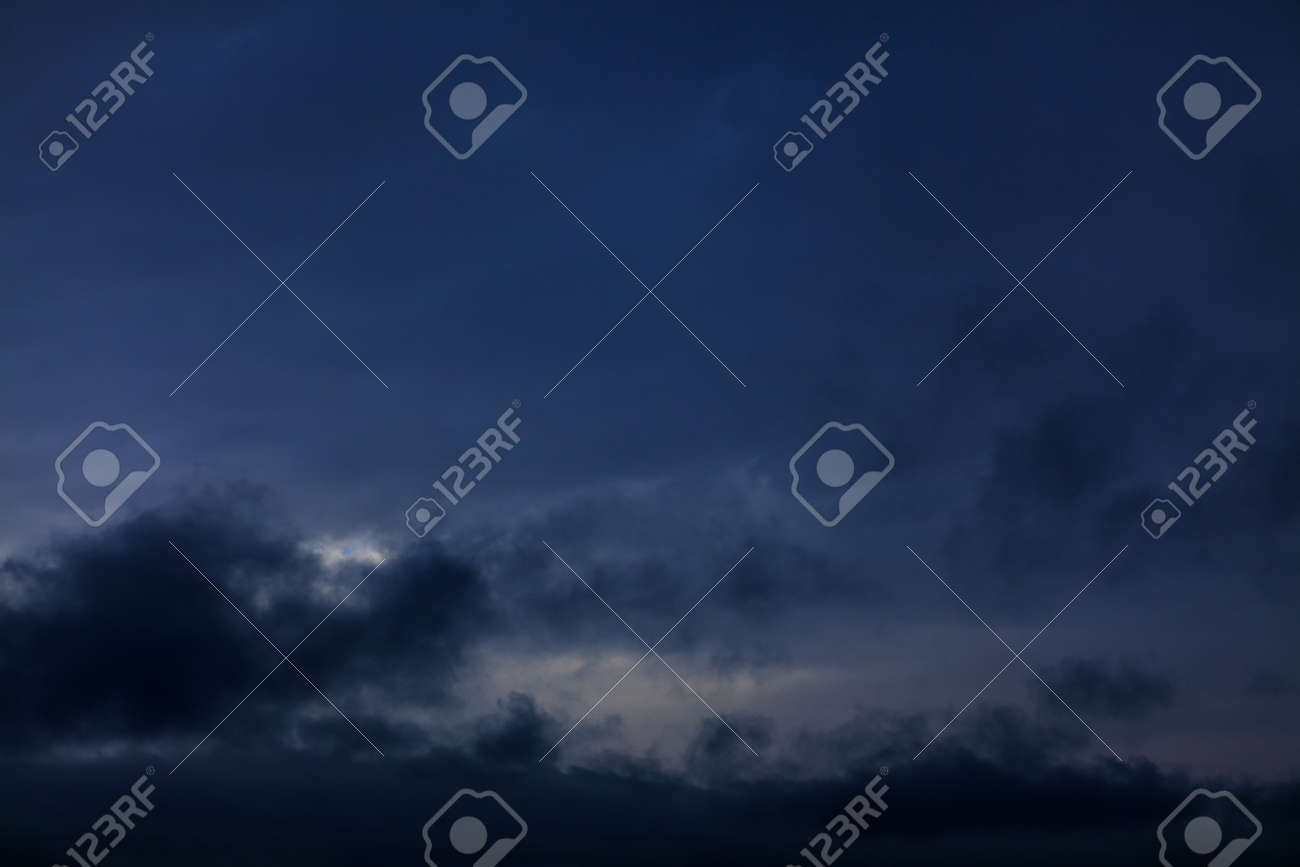 Black clouds at dark sky . Spooky heaven - 167986840 Black clouds at dark sky . Spooky heaven - 167986840