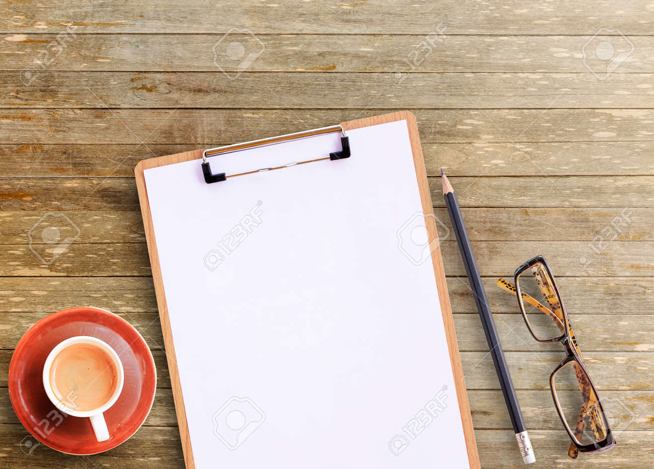 top office table cup brown wooden office desk top view of brown wooden office table with cup coffeeglasses desk view of brown wooden table with cup stock top office table cup brown wooden office desk top view of brown wooden office table with cup coffeeglasses desk view of brown wooden table with cup stock
