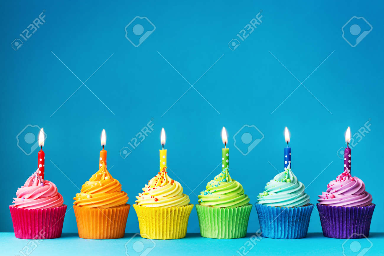 Birthday cupcakes in rainbow colors - 56057335 Birthday cupcakes in rainbow colors - 56057335