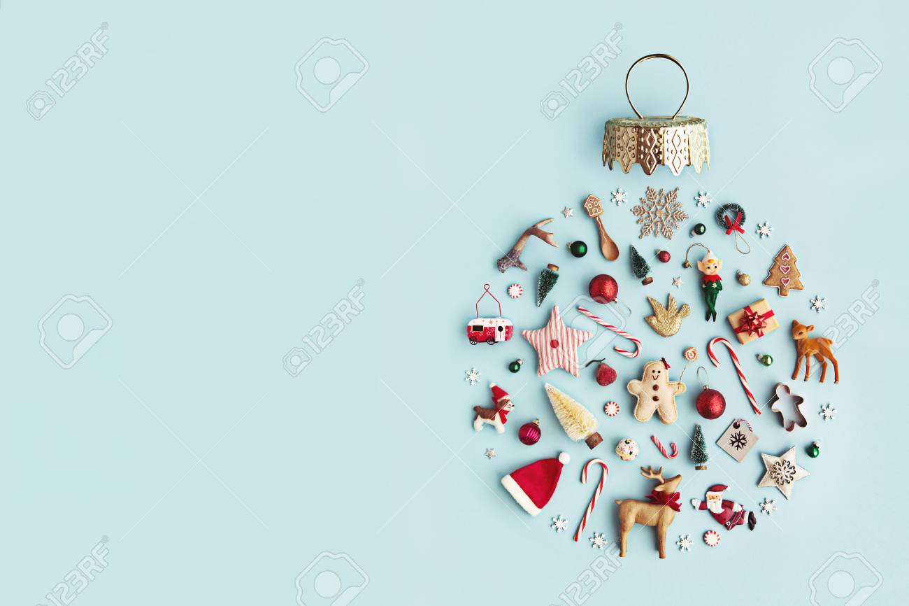 Christmas objects laid out in the shape of a Christmas bauble, overhead view - 88260325 Christmas objects laid out in the shape of a Christmas bauble, overhead view - 88260325