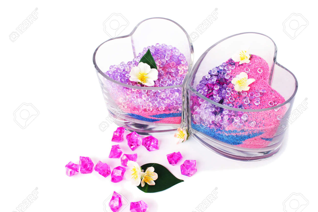 Heart Shape Vases With Colorful Stones And Sand Isolated On White
