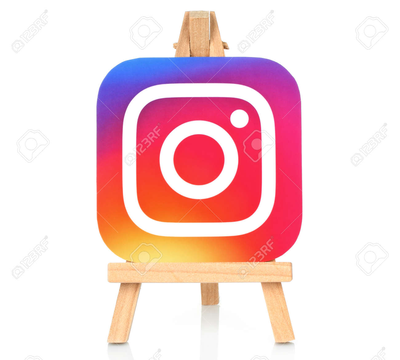Kiev, Ukraine - August 30, 2016: Instagram icon printed on paper and placed on wooden easel. Instagram is an online mobile photo-sharing, video-sharing service - 62534973 Kiev, Ukraine - August 30, 2016: Instagram icon printed on paper and placed on wooden easel. Instagram is an online mobile photo-sharing, video-sharing service - 62534973