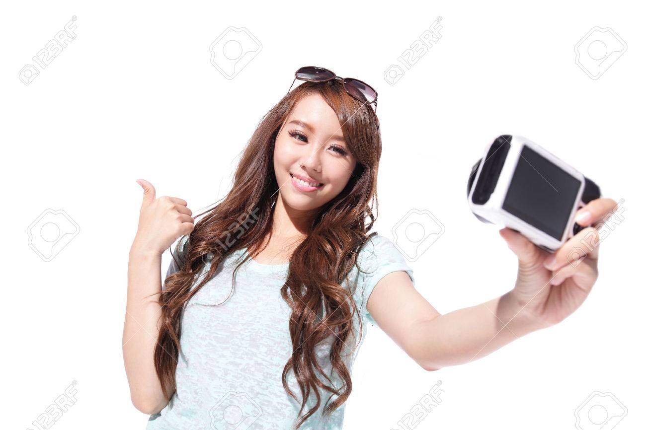 happy young woman taking selfie pictures of herself isolated stock