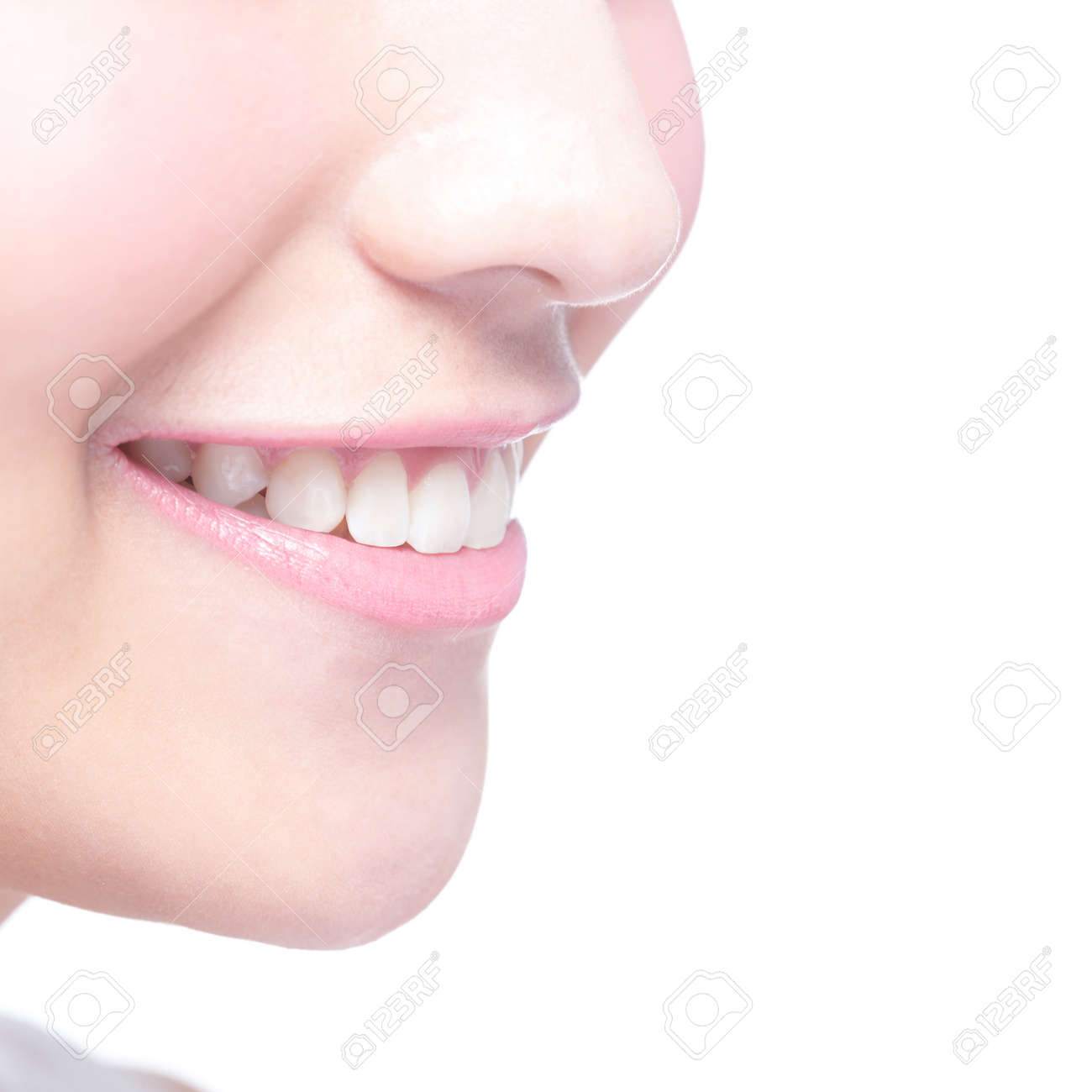 Beautiful young woman health teeth close up and charming smile. Isolated over white background, asian beauty - 40856167 Beautiful young woman health teeth close up and charming smile. Isolated over white background, asian beauty - 40856167
