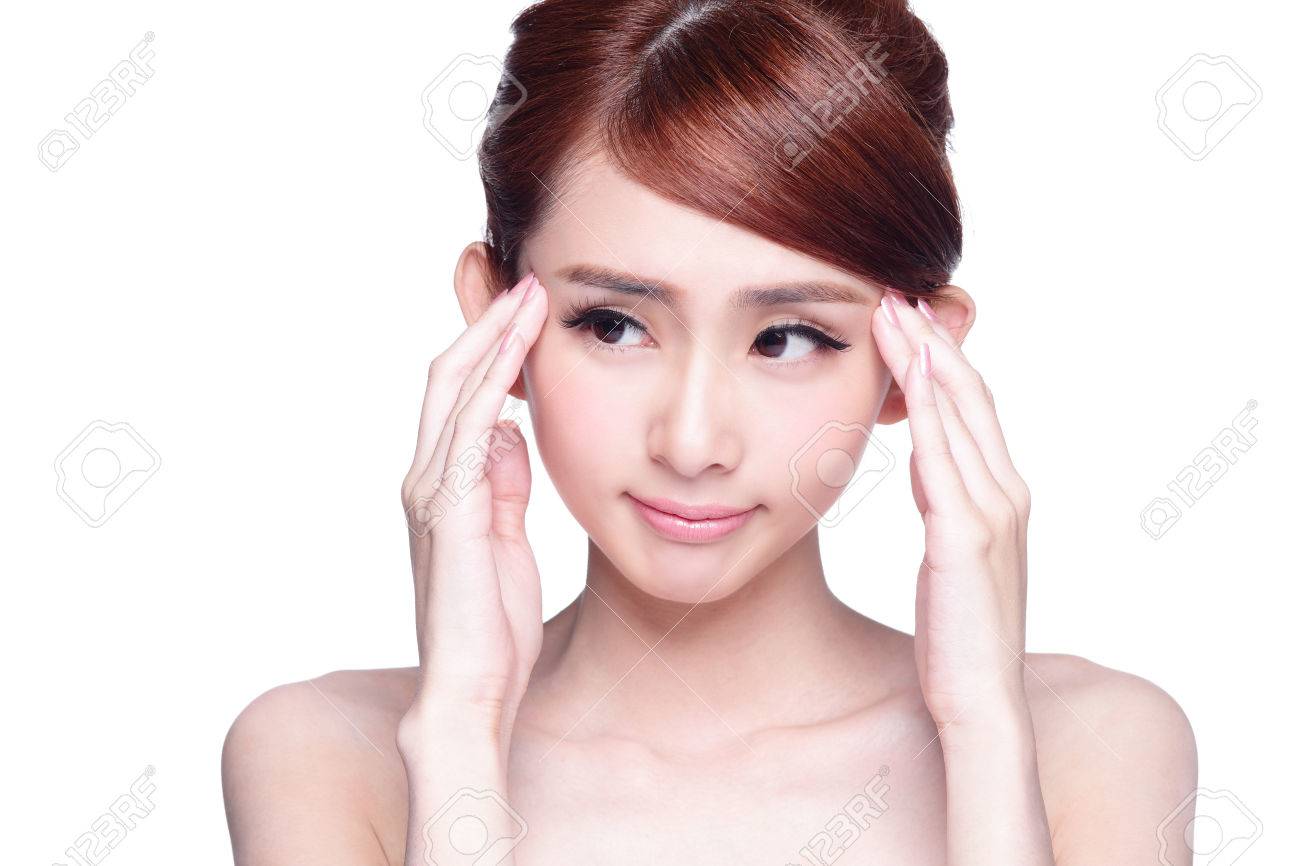 不幸な顔をして彼女の目を指している美しい女性 の写真素材 画像素材 Image