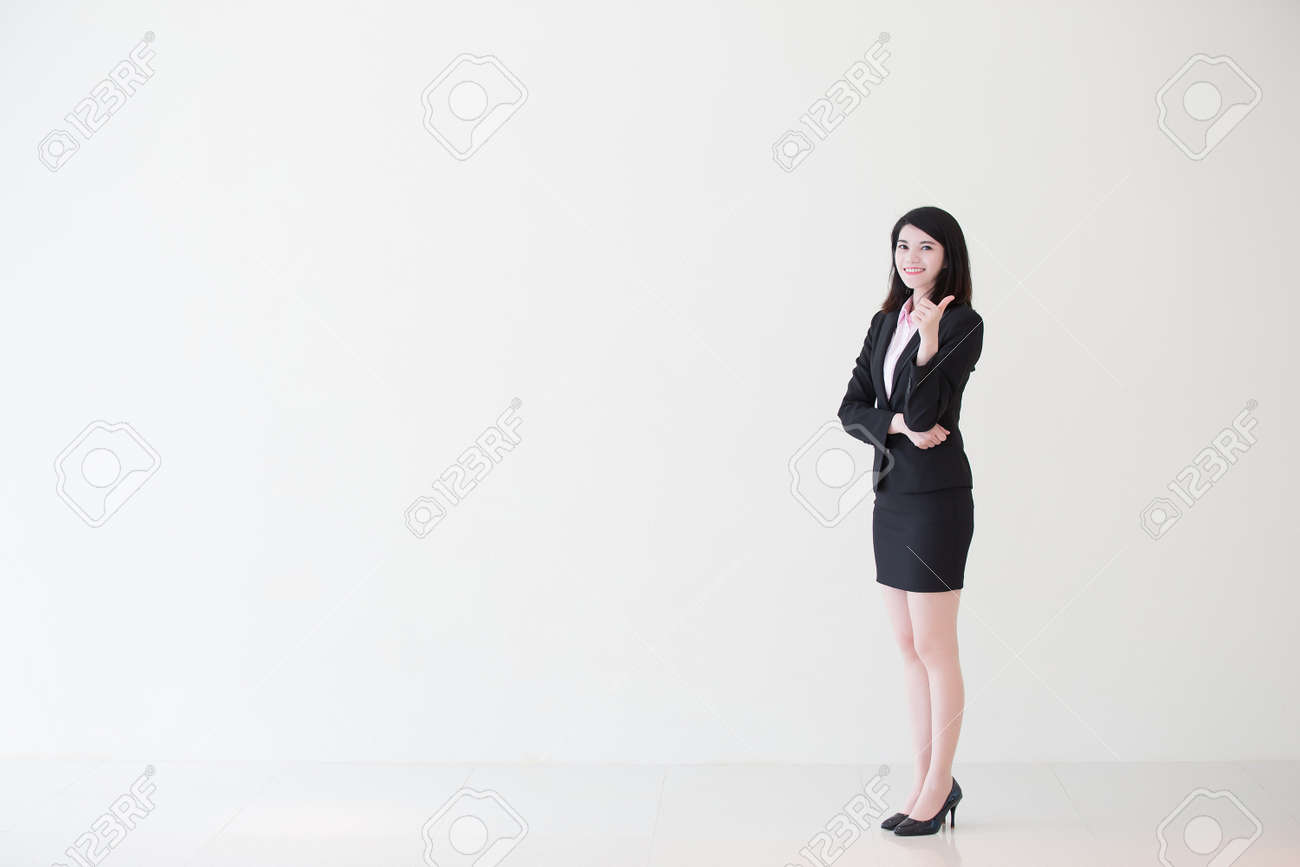 business woman show thumb up with white wall background, great for your design or text, asian - 59833619 business woman show thumb up with white wall background, great for your design or text, asian - 59833619