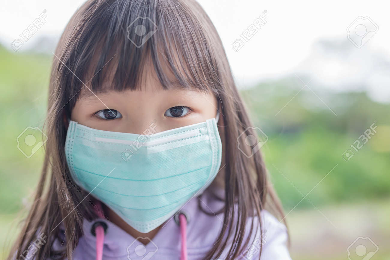 Download Cute Little Girl Get Cold Wear Mask Asian Stock Photo Picture And Royalty Free Image Image 71742770 PSD Mockup Templates