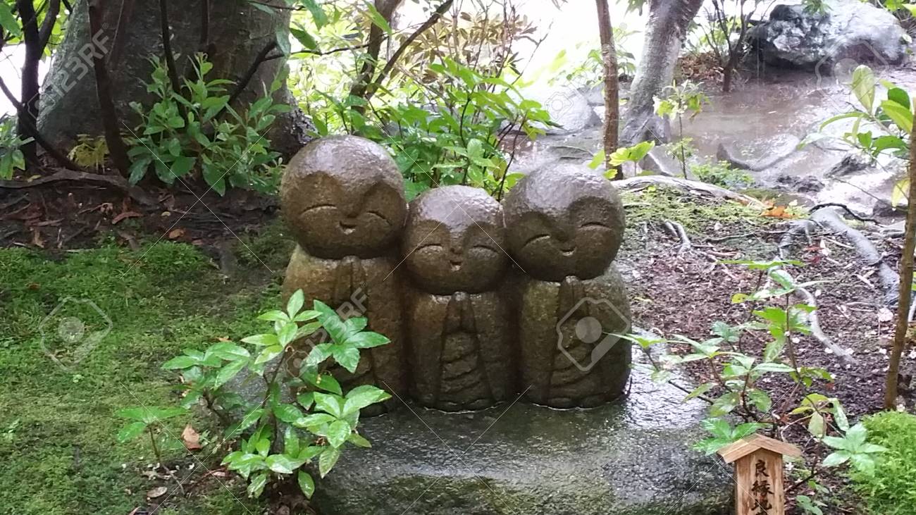 Three Cuties Bustu Statue In The Japanese Garden Stock Photo