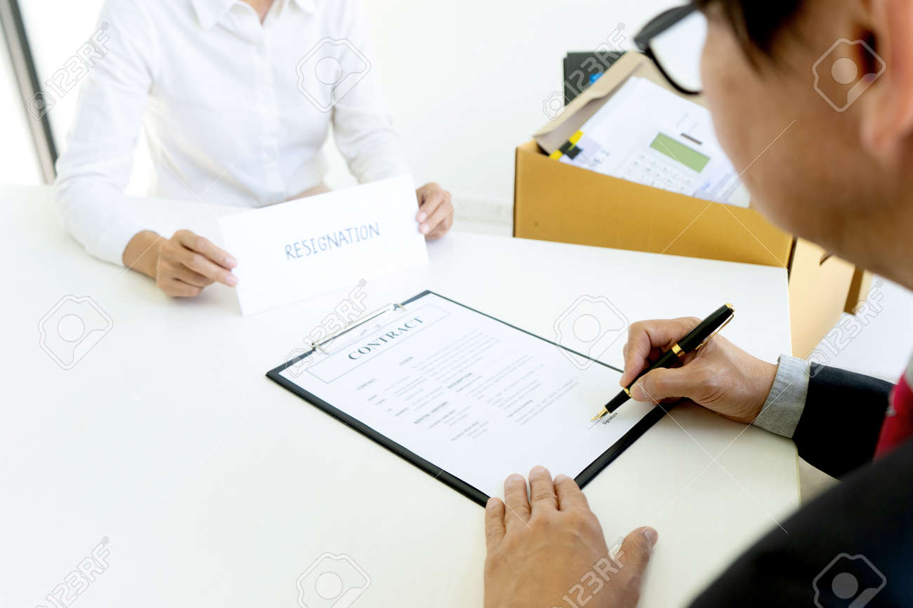 Sale representative or insurance broker offer house purchase contract to buy a house or apartment and give home key chain to customer - 169228095 Sale representative or insurance broker offer house purchase contract to buy a house or apartment and give home key chain to customer - 169228095