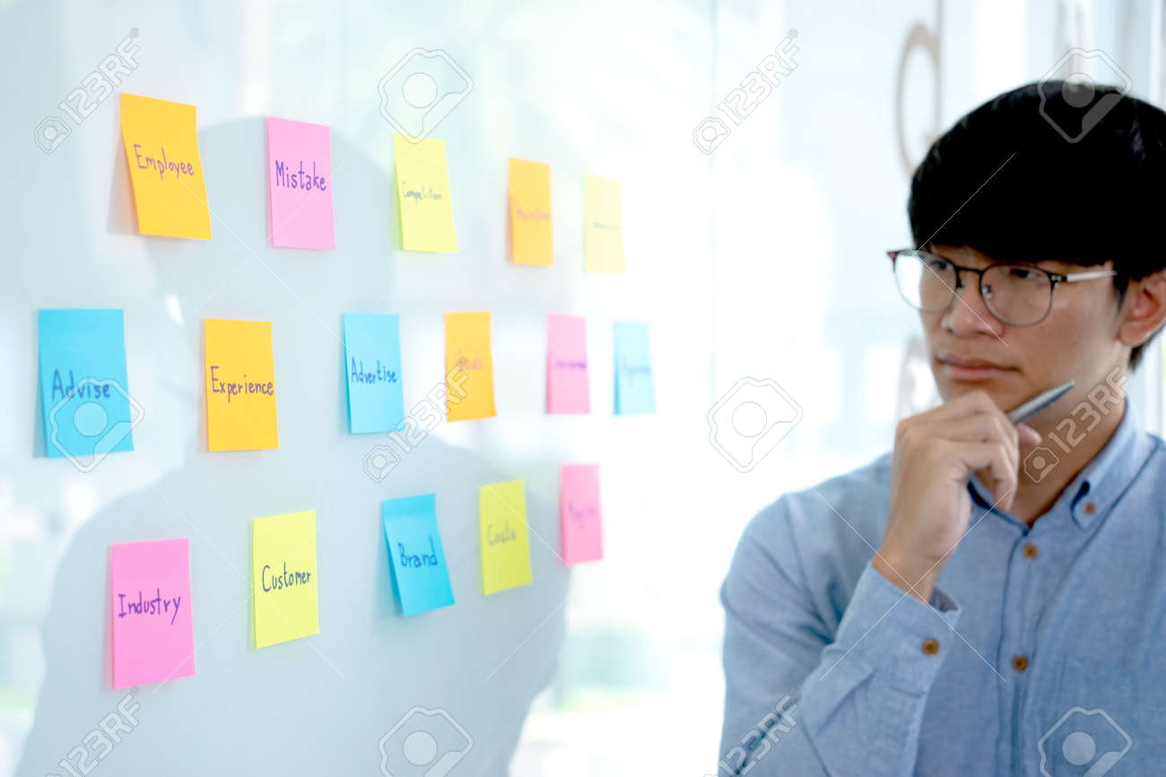 Business people are answering telephone conversations using a headset to provide details and answer customer questions call centre or telemarketing concept. - 169229965 Business people are answering telephone conversations using a headset to provide details and answer customer questions call centre or telemarketing concept. - 169229965