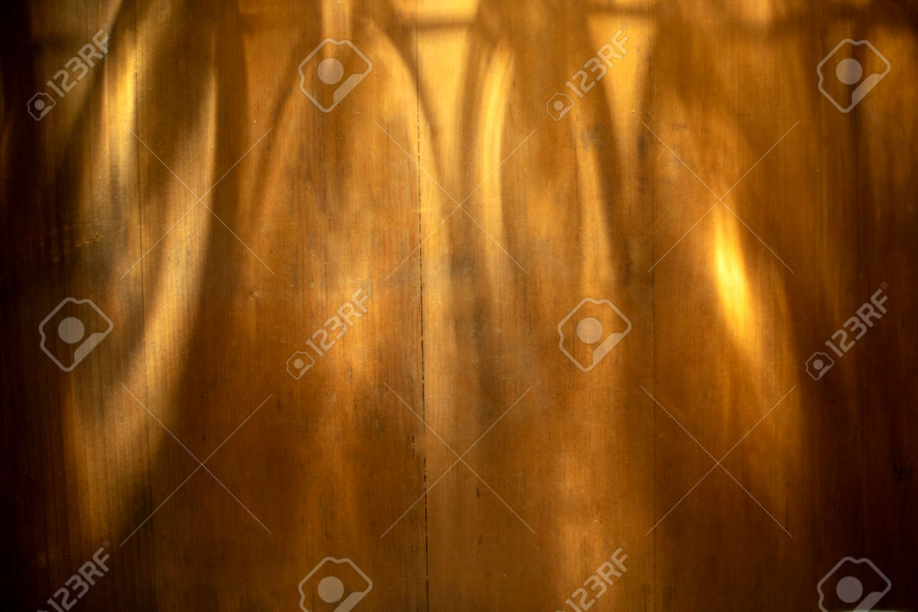 Light beam with Shadow on brown wooden background Texture Background Suitable for Product Presentation Backdrop Display and Mockup. - 169229429 Light beam with Shadow on brown wooden background Texture Background Suitable for Product Presentation Backdrop Display and Mockup. - 169229429
