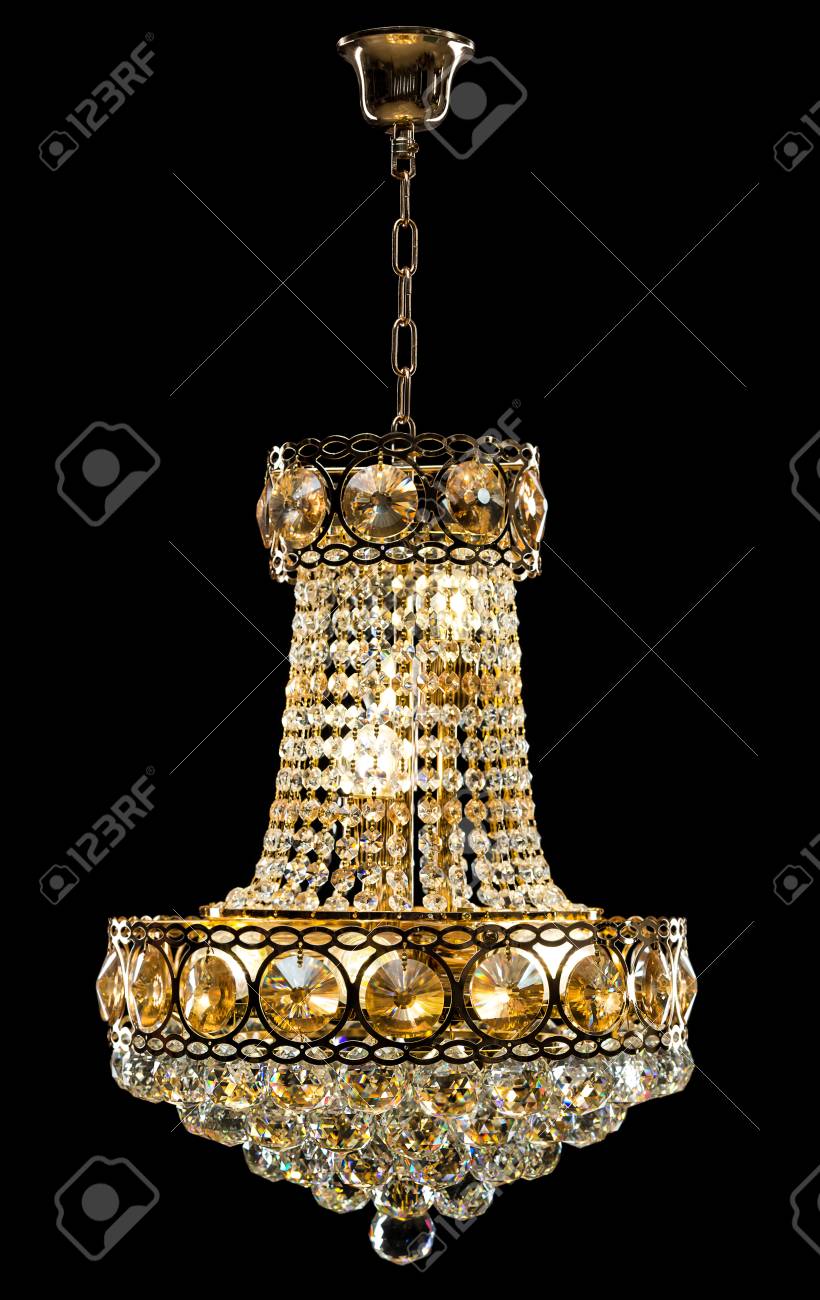 Large Crystal Chandelier In Baroque Style Isolated On Black Background