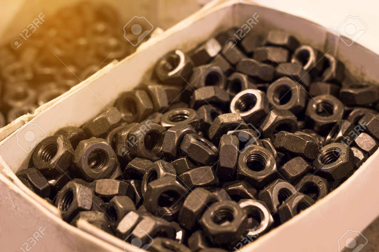 Bolts And Nuts On Glass Table In Industry Prepare For Repair Work