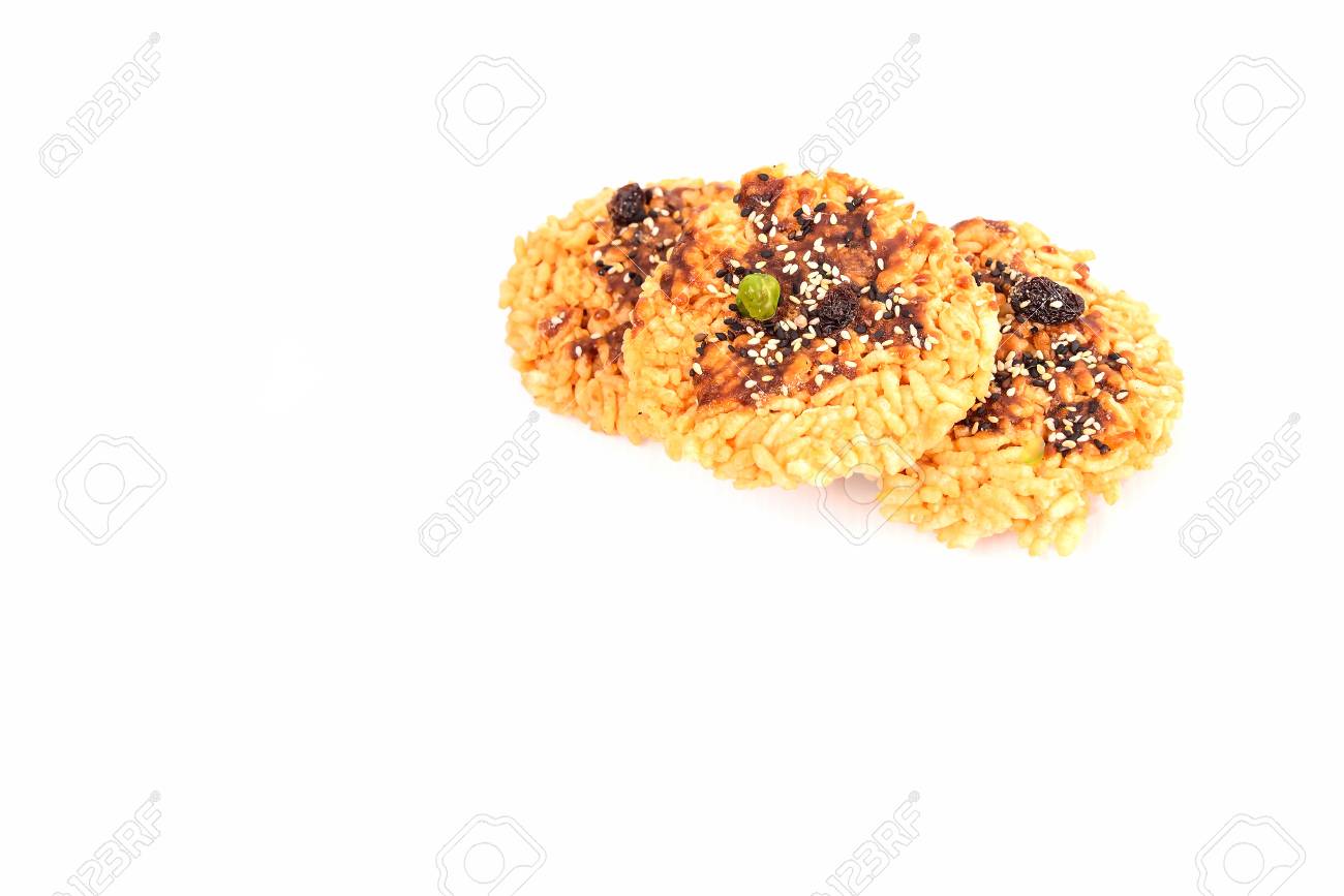 The rice is topped with sugar and the seeds are placed on a white background. - 87709164 The rice is topped with sugar and the seeds are placed on a white background. - 87709164