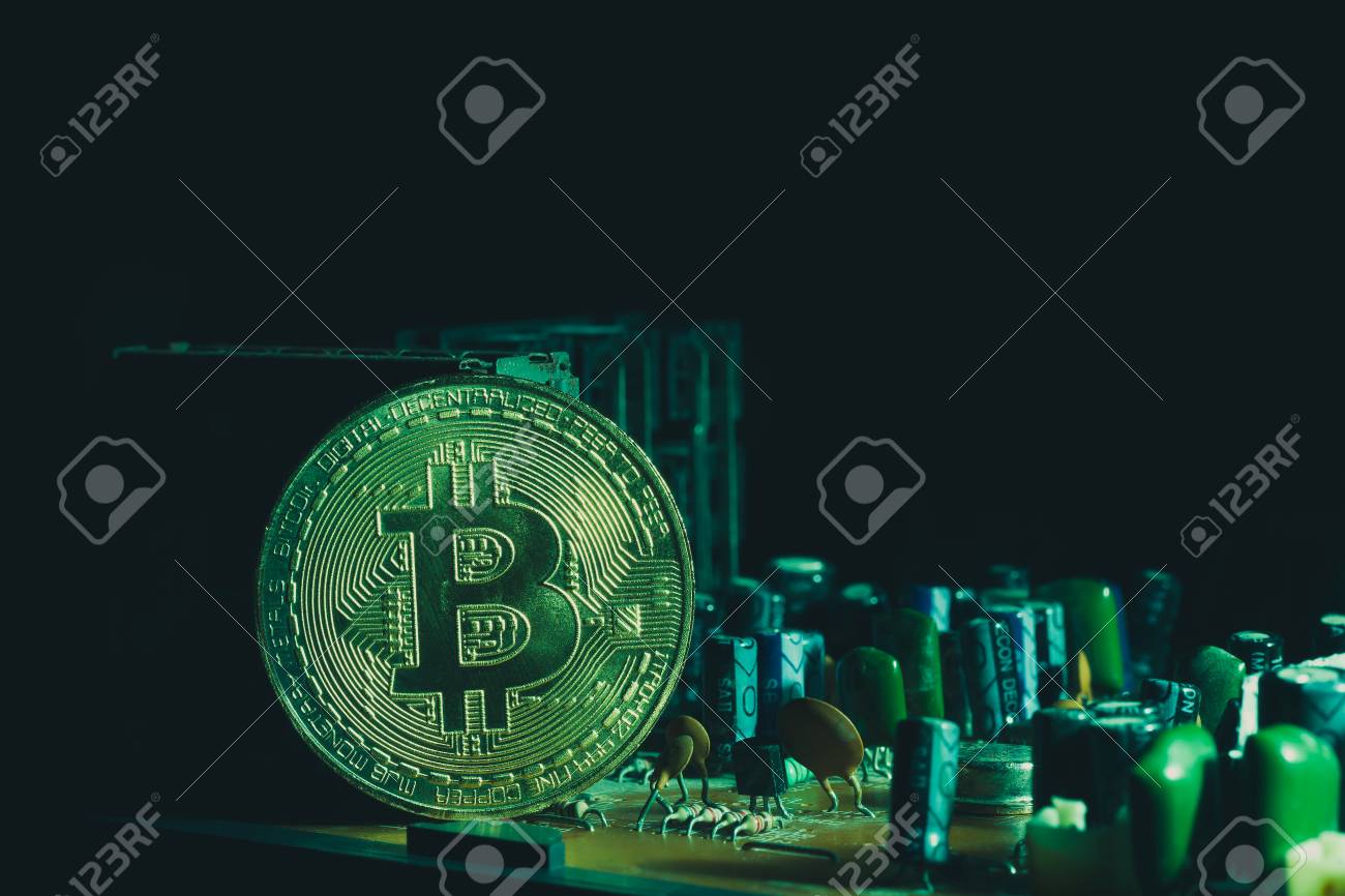 Bitcoin Placed On The Circuit Of Electronic Mainboard Concept - 