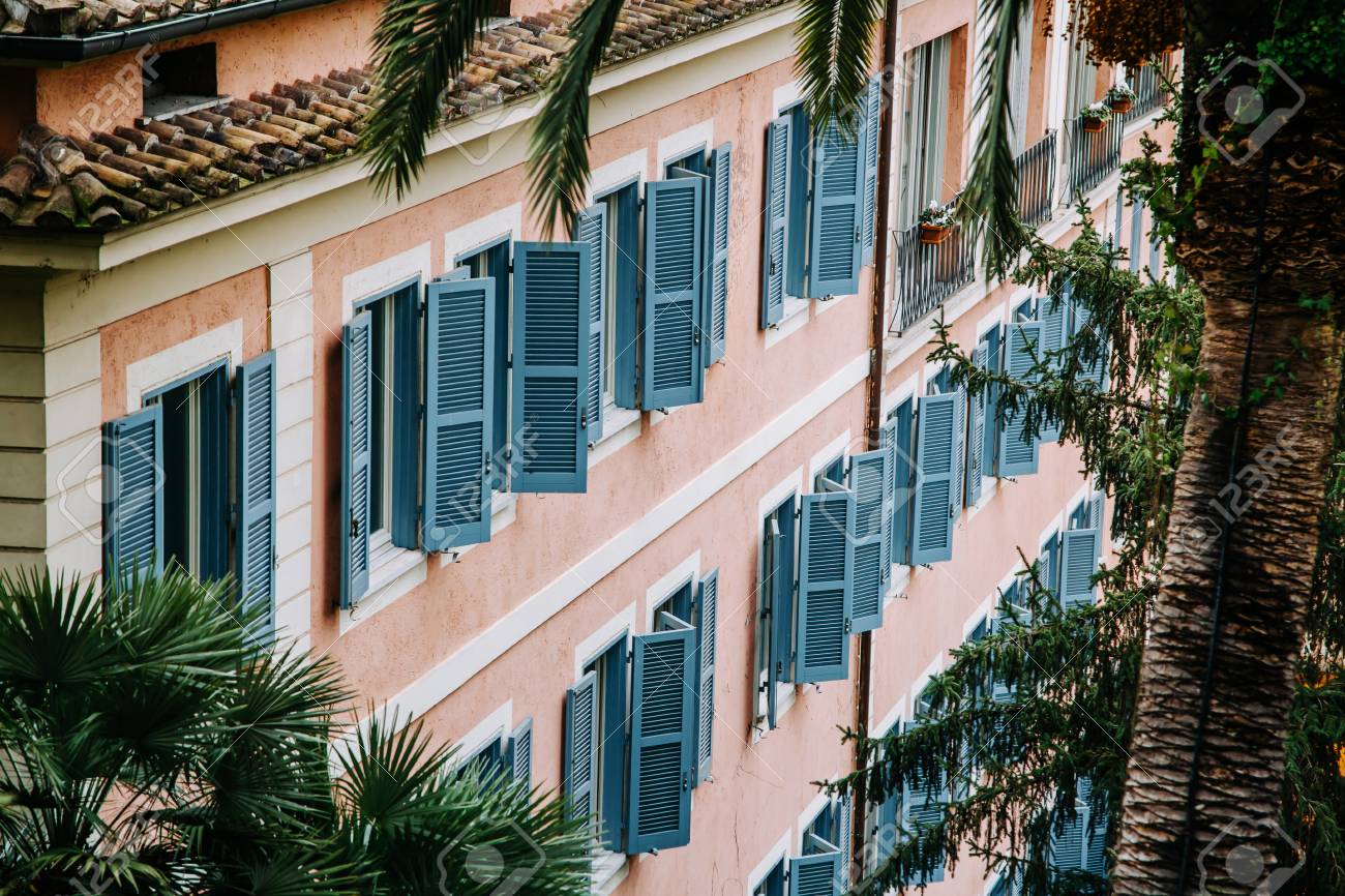 european style windows outside european style windows with wooden shutters house exterior surrounded palm trees stock photo style windows with wooden shutters exterior european style windows outside european style windows with wooden shutters house exterior surrounded palm trees stock photo style windows with wooden shutters exterior