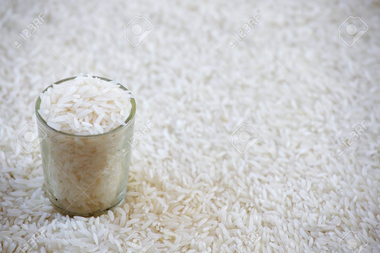 Measuring Cup Rice With Rice Grain Background Stock Photo Picture And Royalty Free Image Image