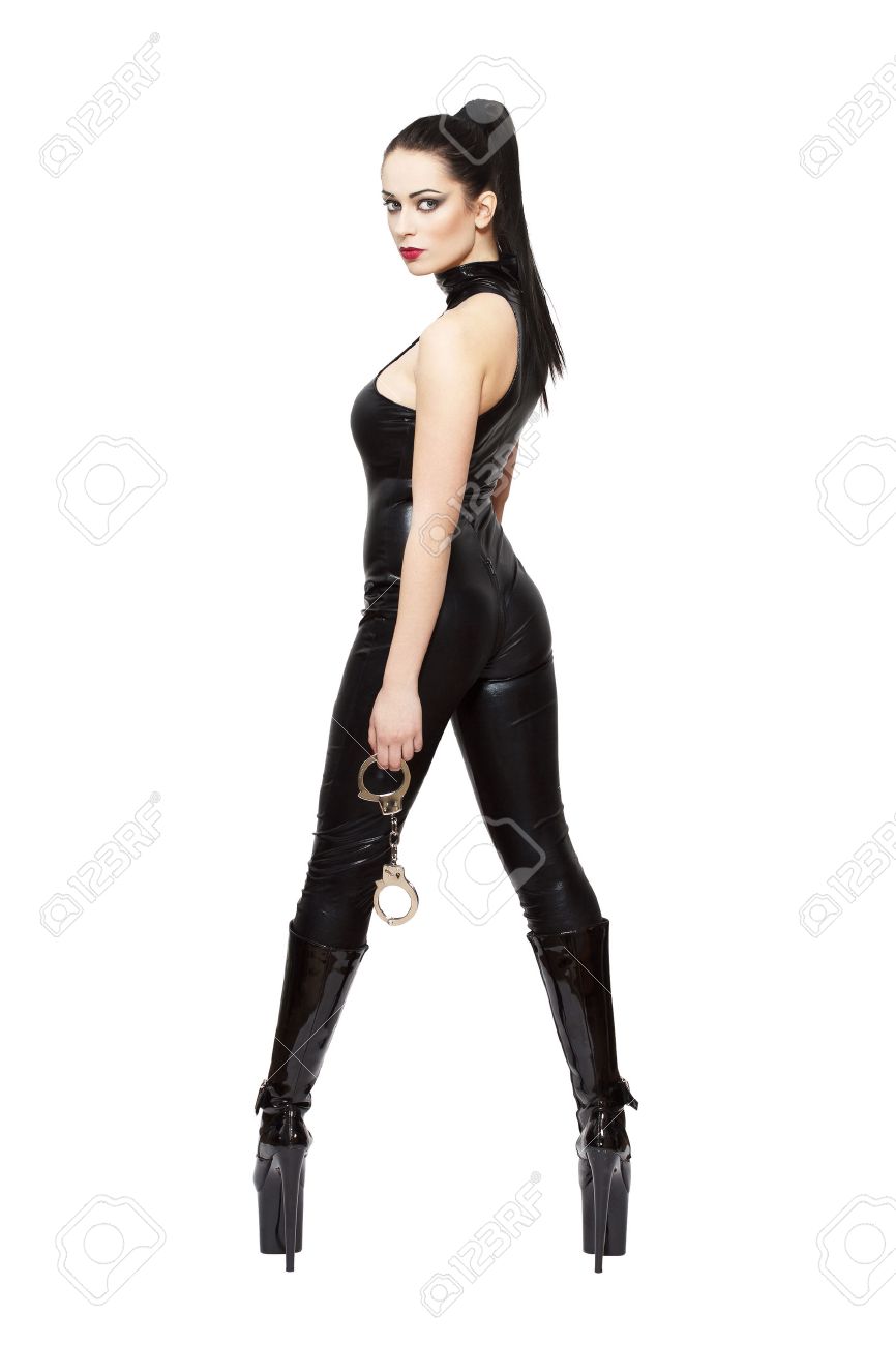 Vrouw In Latex Catsuit En Hoge Hak Platform Laarzen Bedrijf Vrouw In Goth Laarzen Met Hoge Hak Geïsoleerd Royalty Vrije