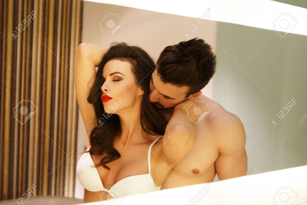 Sexy Milf Woman With Young Macho Lover Posing In Mirror Stock Photo,  Picture and Royalty Free Image. Image 39589165.